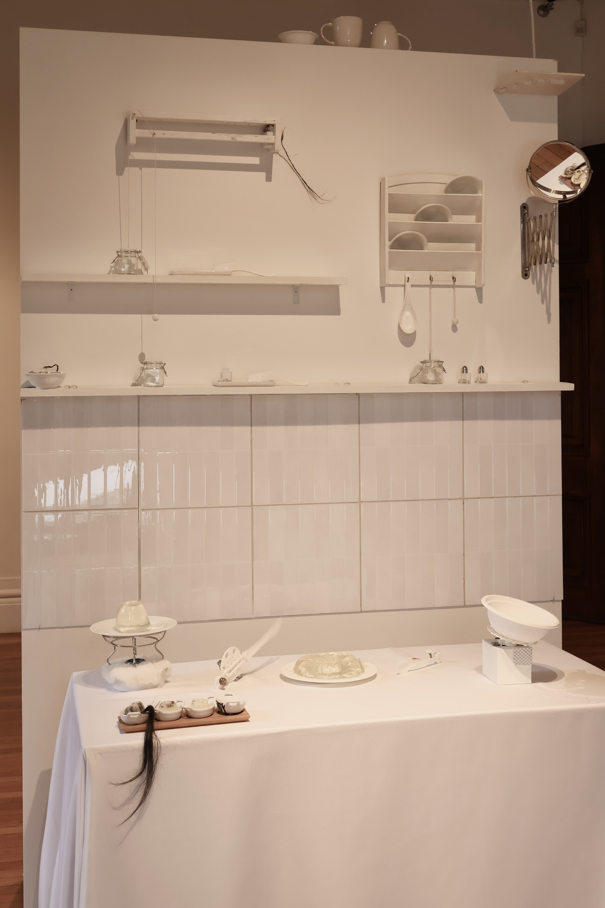 Zixi Wang 'Counter Actions' 2026 Kitchenware, motors, fabricated parts, 60 × 96 