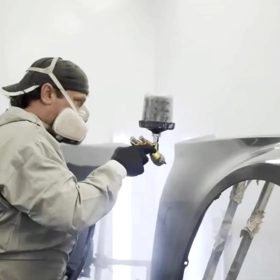 painter in paint booth