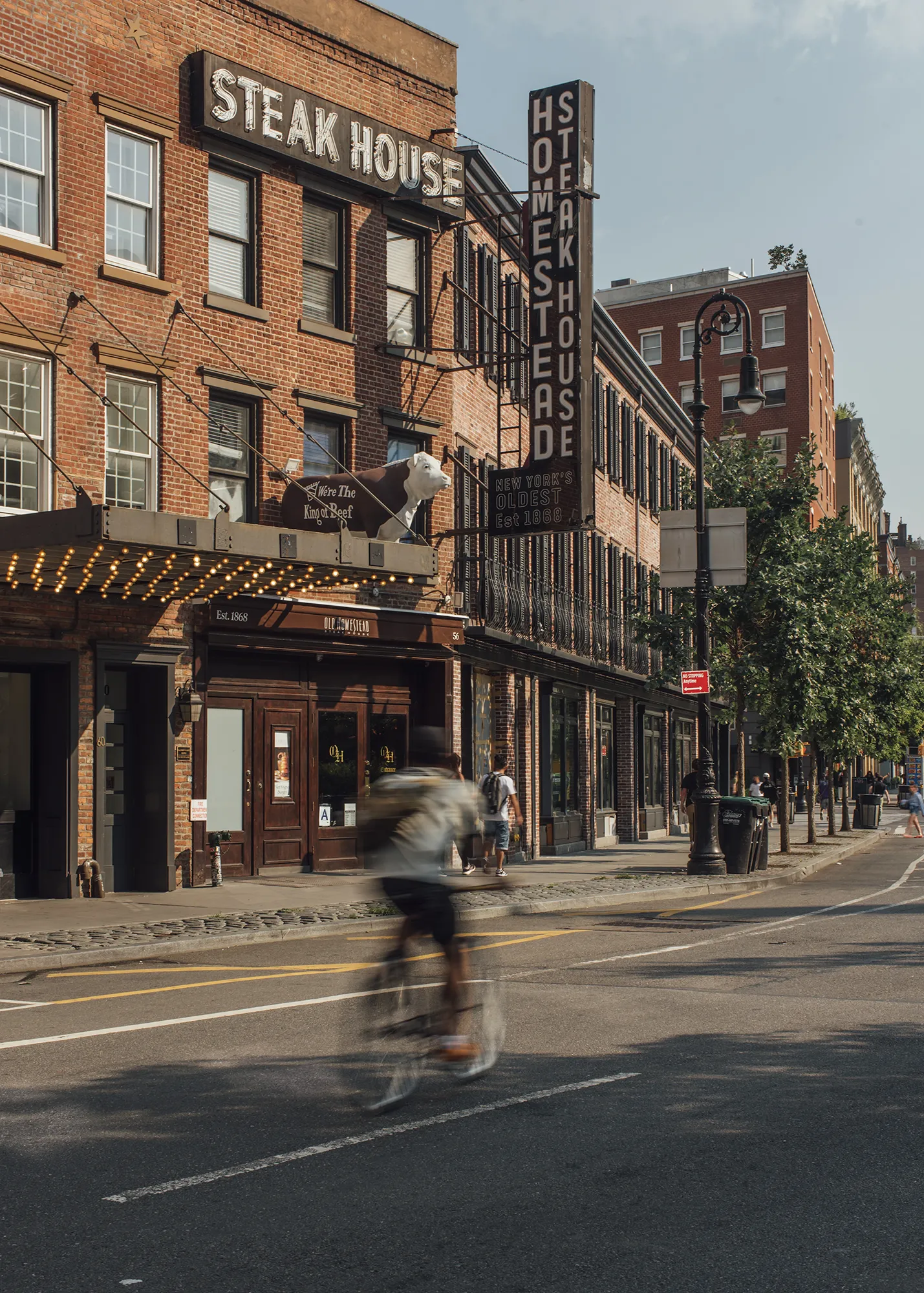 A building exterior featuring a prominent sign displaying its name or purpose.