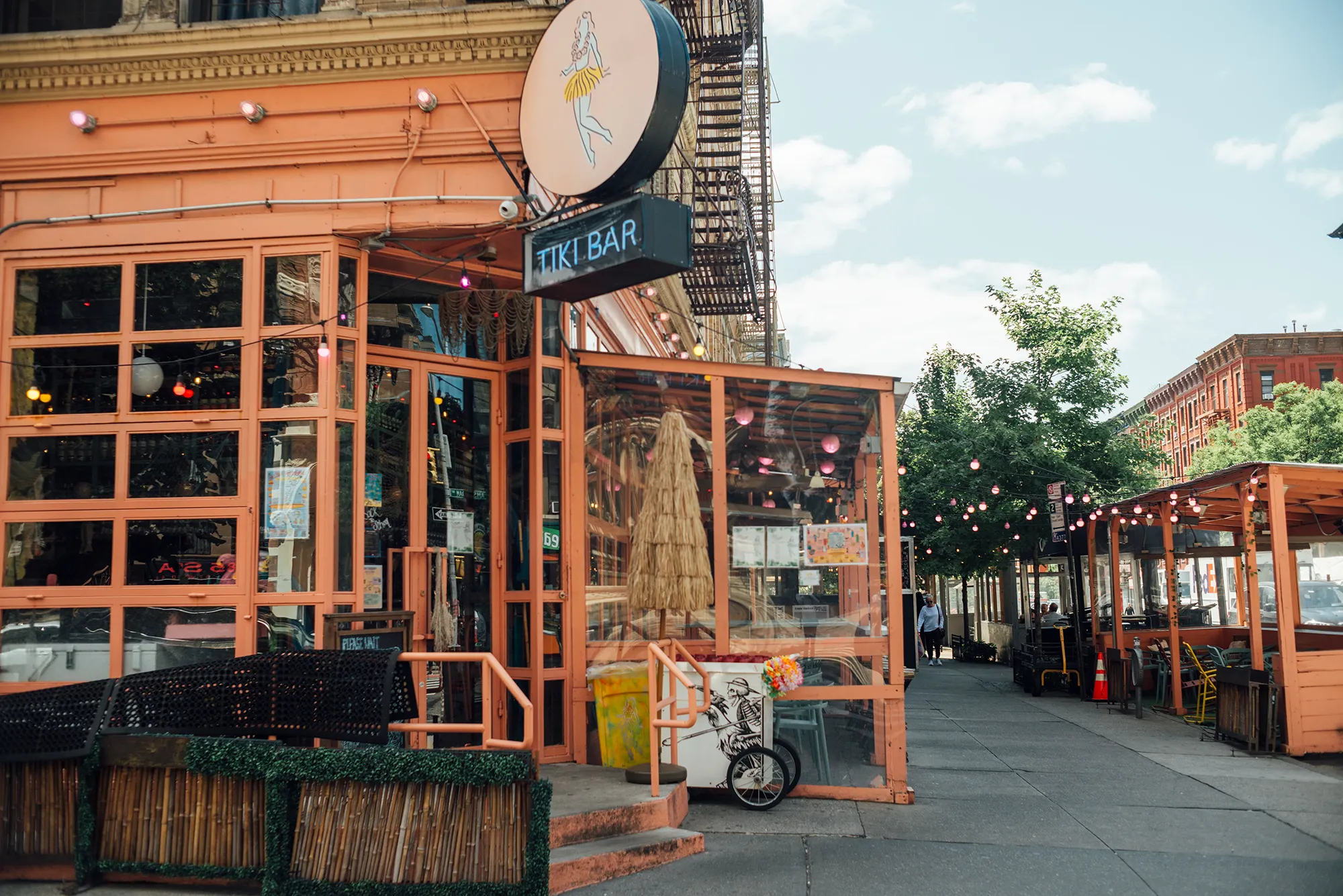 A restaurant exterior featuring a bicycle parked outside, inviting patrons to enjoy a meal.