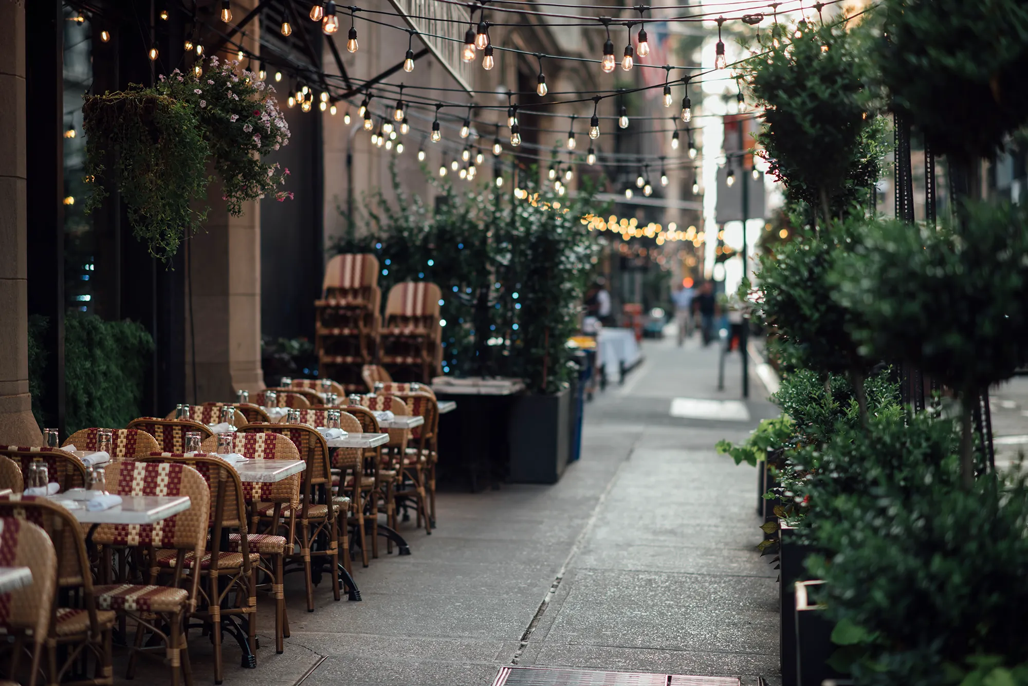 A restaurant interior featuring neatly arranged tables and chairs throughout the dining area.
