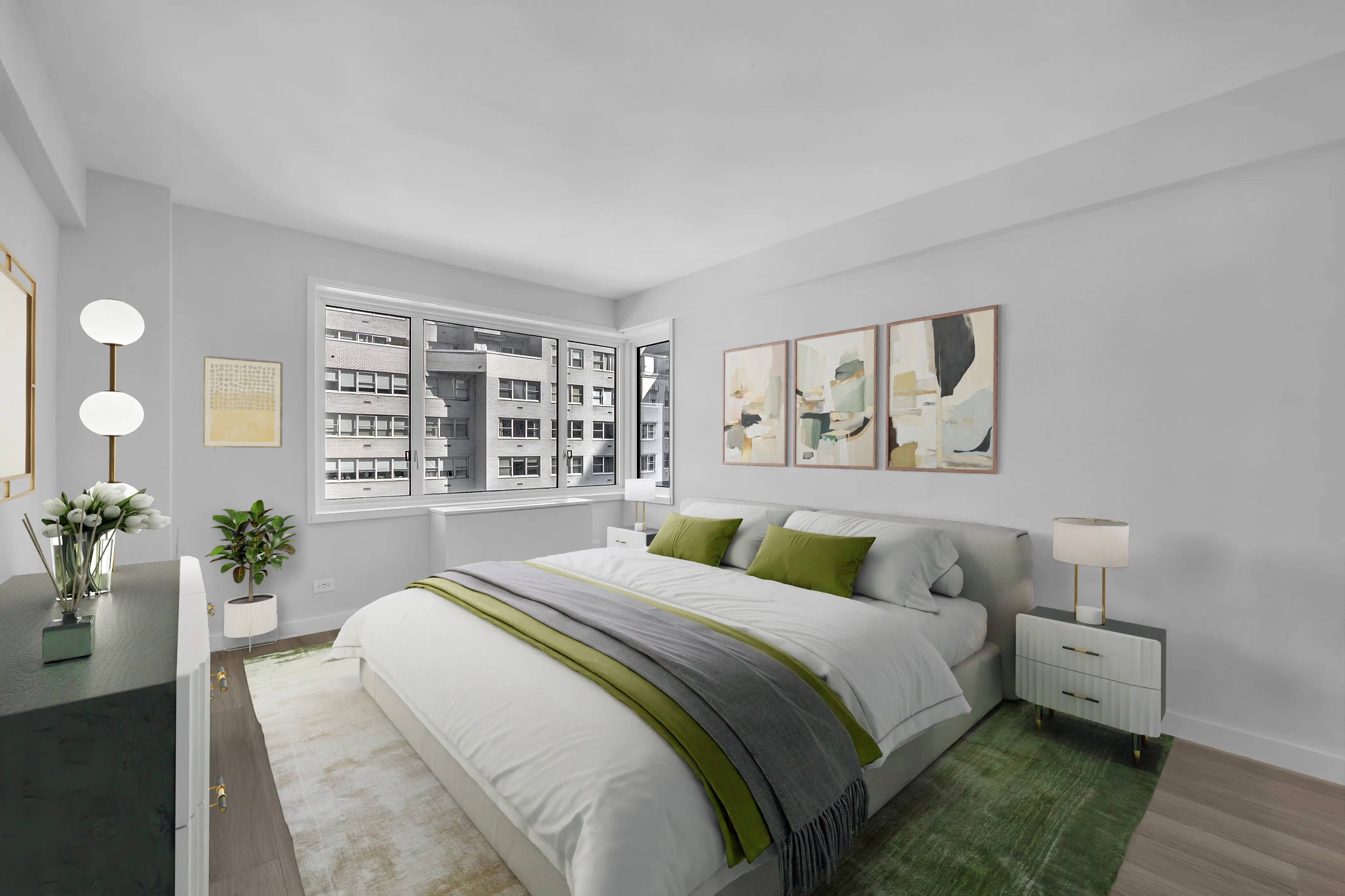 A cozy bedroom featuring a green and white bed, complemented by soft lighting and minimalistic decor.