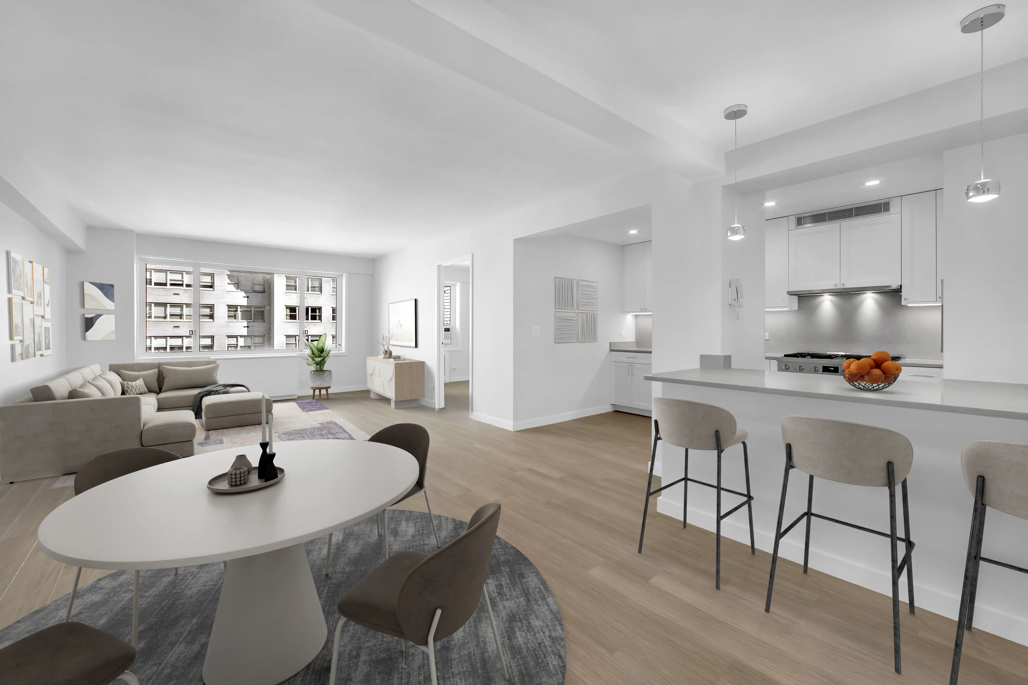 A modern apartment featuring an open kitchen and living room with contemporary furnishings and bright natural light.