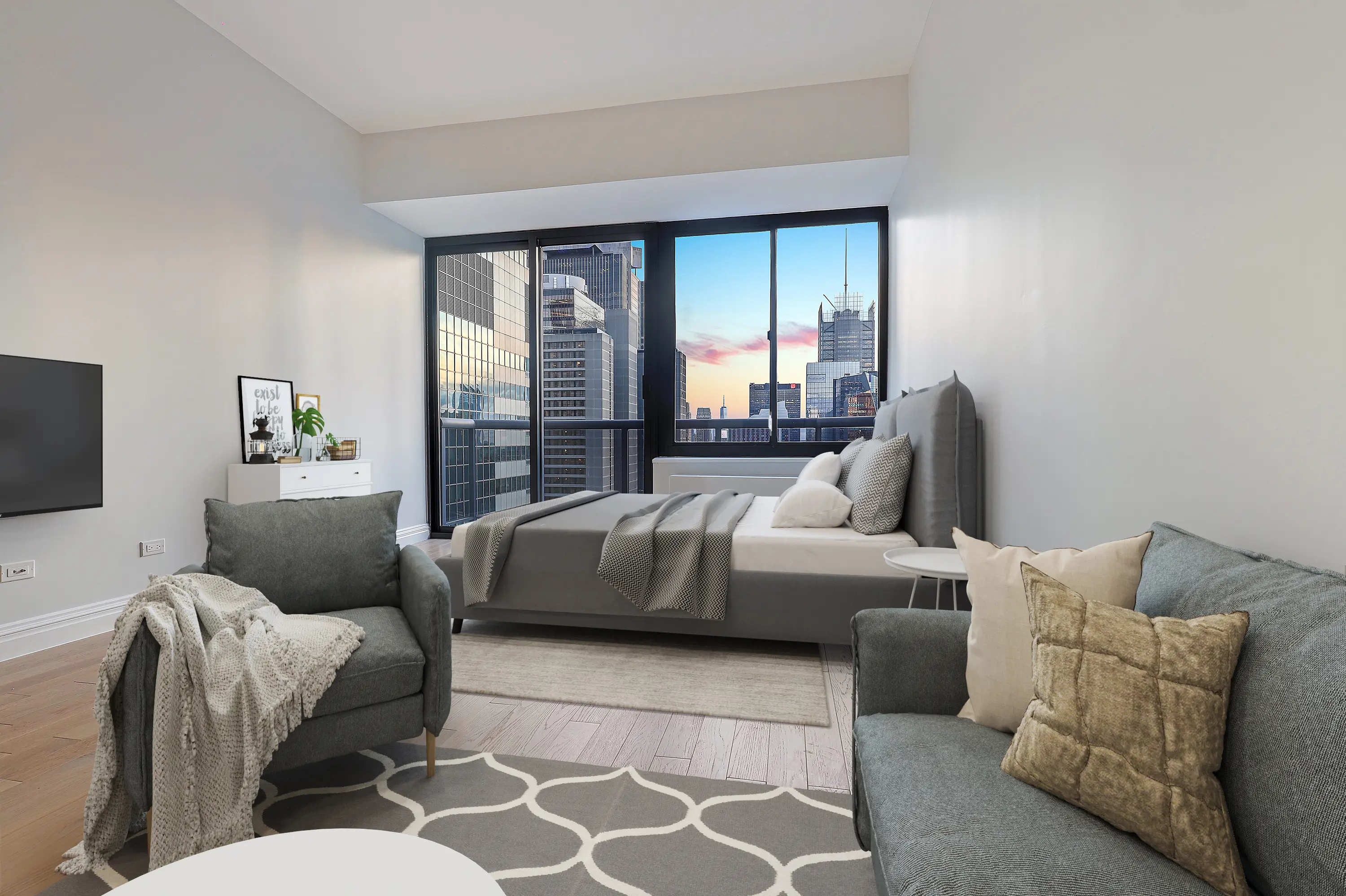A cozy bedroom featuring a couch, a chair, and a television for relaxation and entertainment.