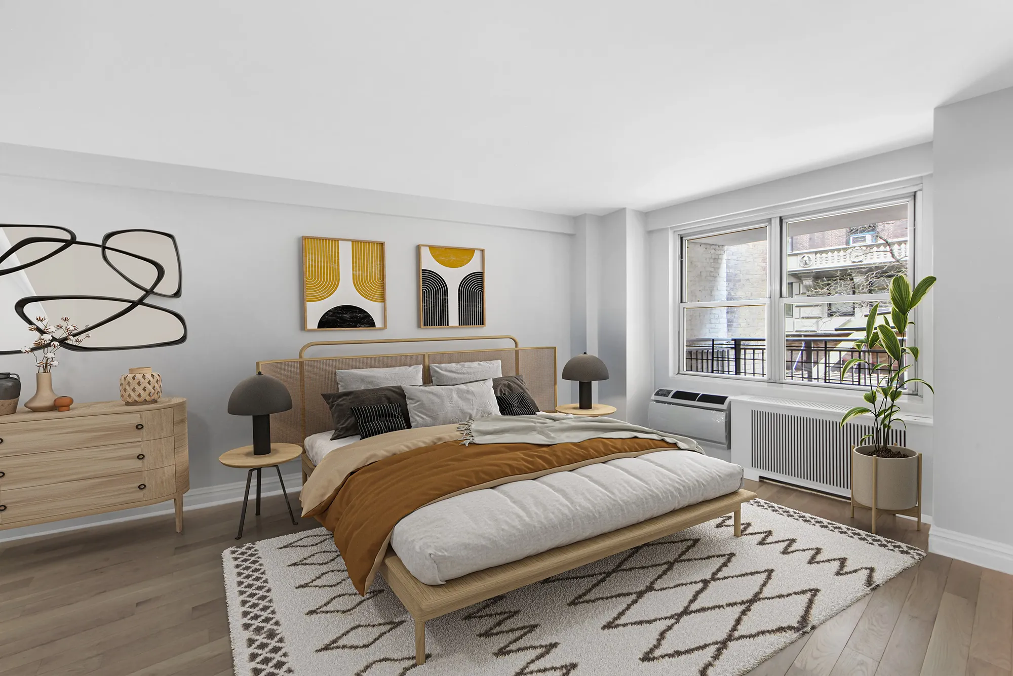 A cozy bedroom featuring a bed, a dresser, and a window allowing natural light to enter the space.