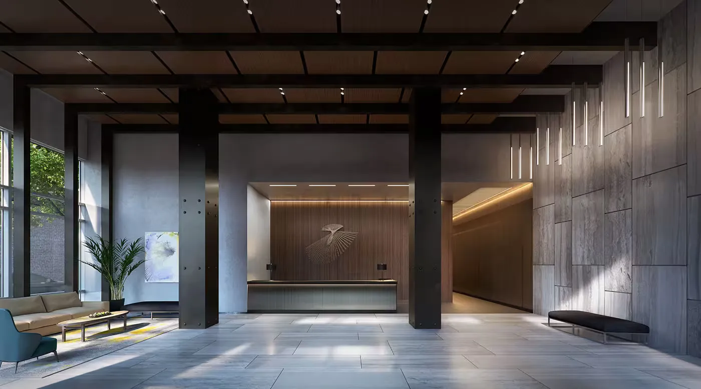 Modern apartment building lobby featuring sleek furniture and contemporary decor with large windows allowing natural light.