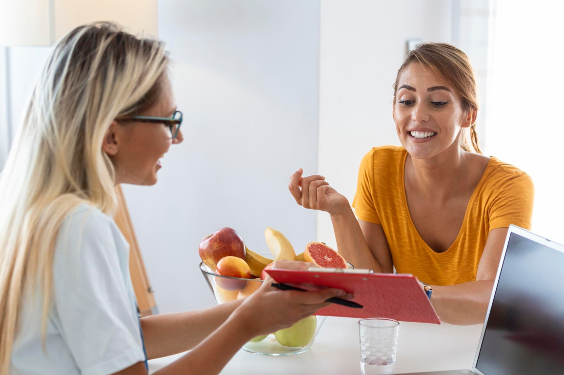 A woman consulting with a nutrition expert