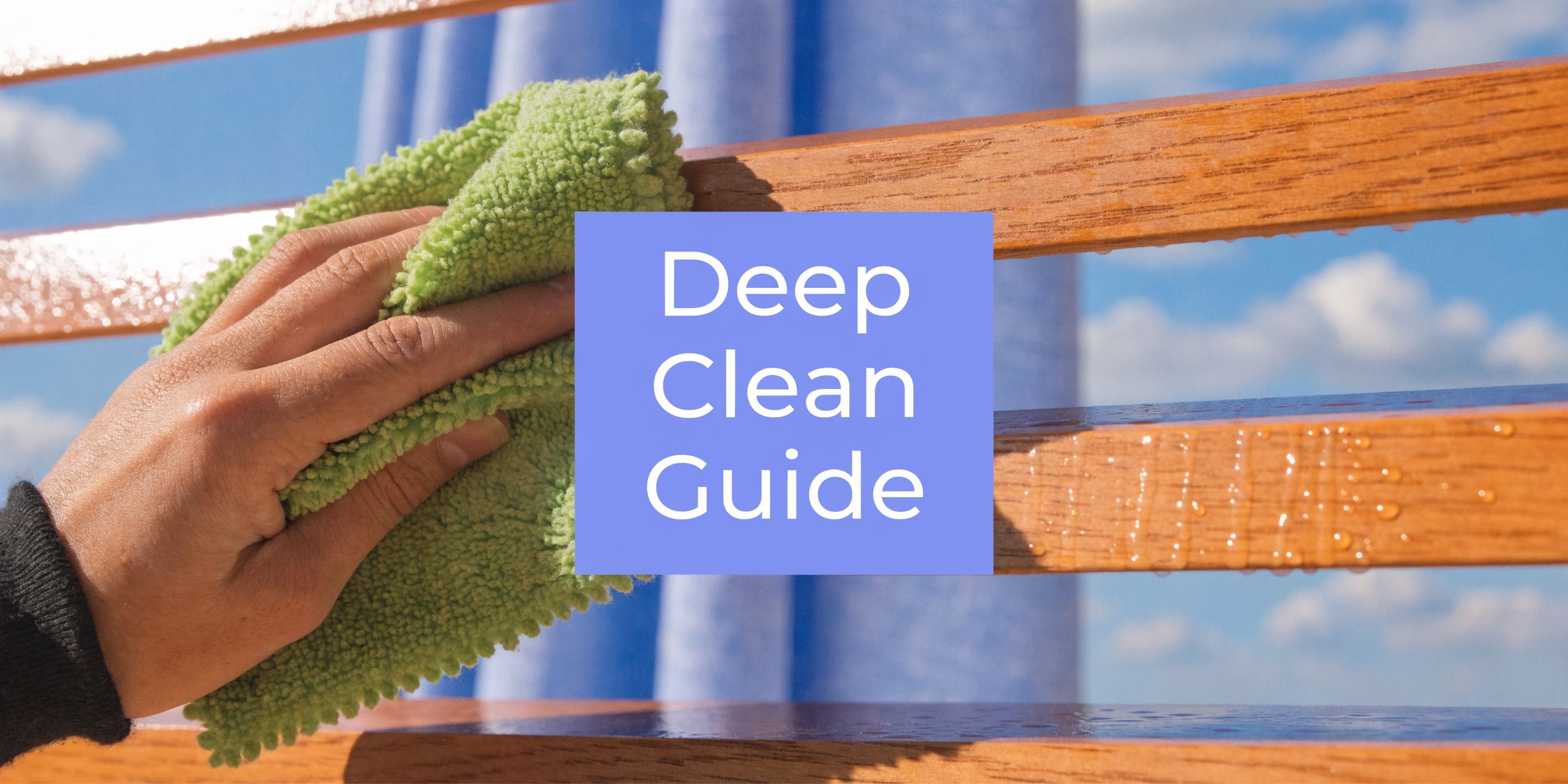 A hand wiping wooden blinds with a green microfiber cloth for a deep cleaning process.