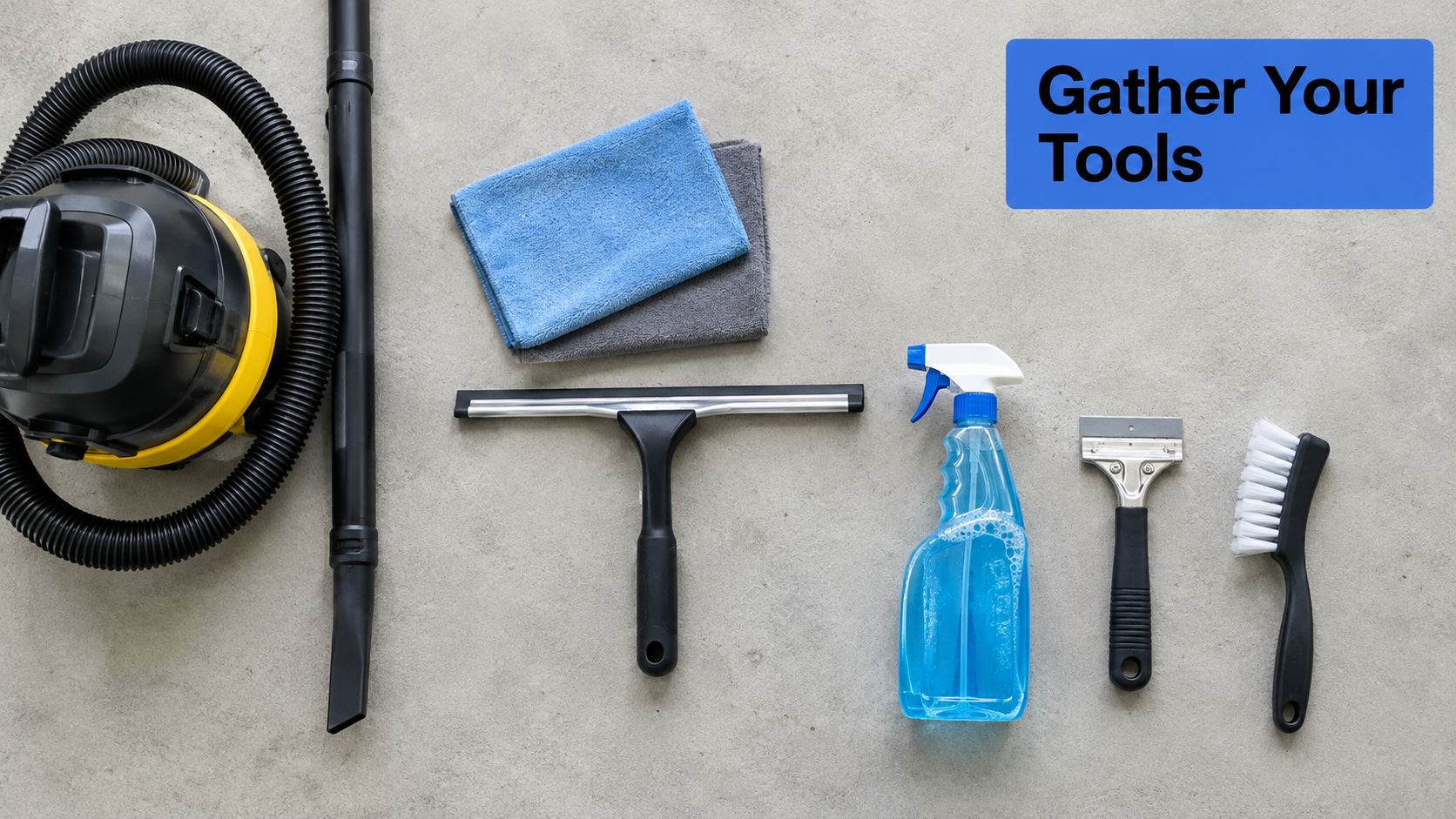 A top-down view of cleaning supplies for sliding window cleaning including a vacuum, cloths, squeegee, and brushes.