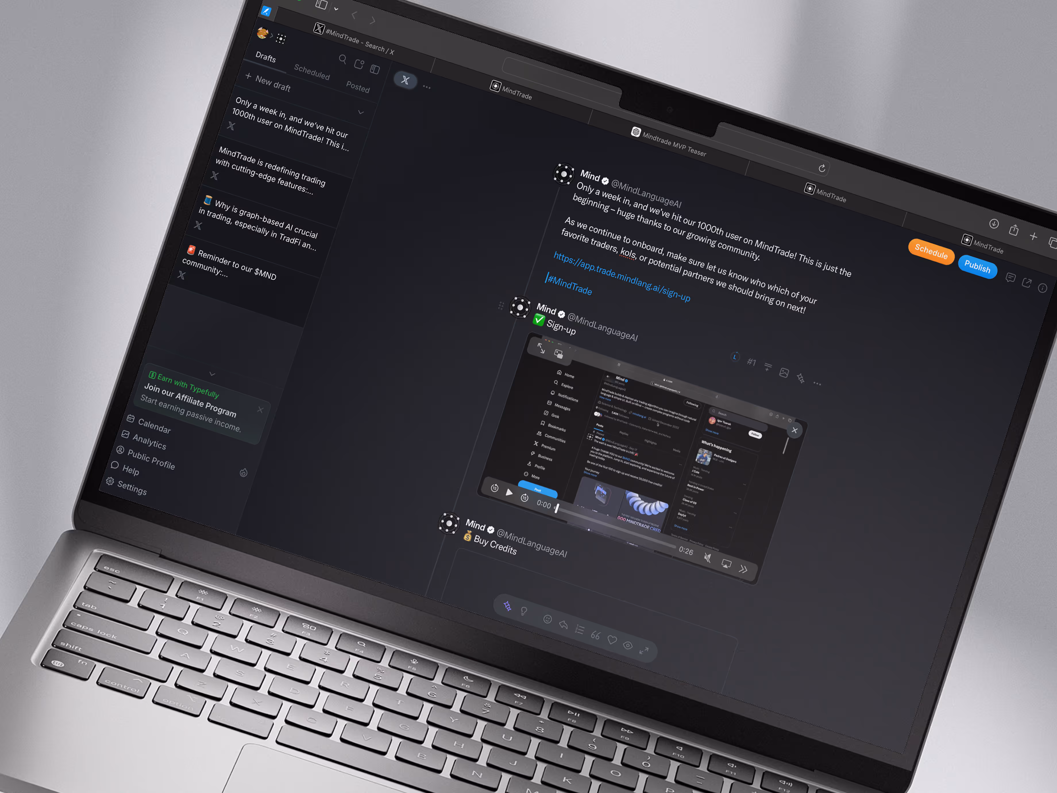 Marketing dashboard for MindTrade shown on a laptop using Typefully, a platform for drafting and scheduling Twitter posts. The screen displays a tweet announcing the milestone of 1,000 users, including a video preview of the MindTrade MVP. Visible elements include post scheduling, affiliate program promotion, and social media engagement tools, highlighting the brand’s growth in algorithmic crypto trading.