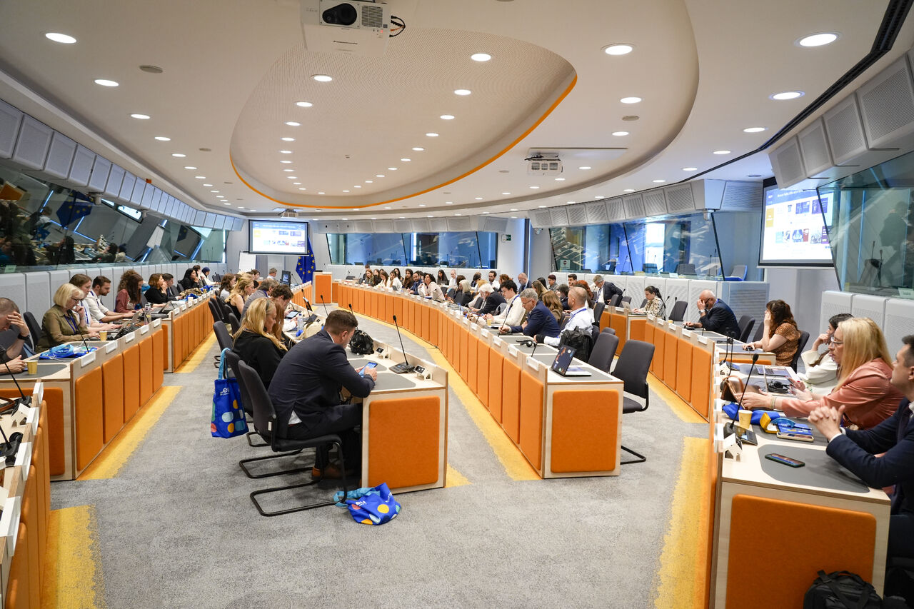 Delegates attending a formal conference