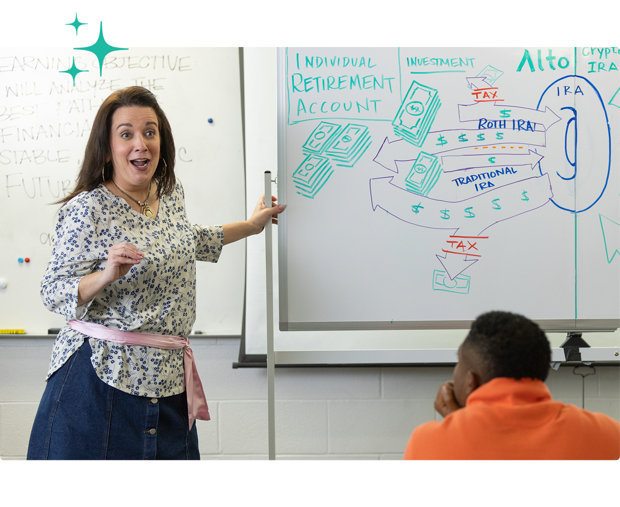 A still from the Alto Crypto video showing a teacher explaining Alto IRA on a white board