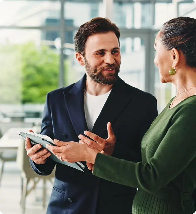 Advisors talking in an office