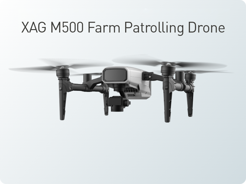 XAG M500 farm patrolling drone with four propellers and a front camera flying.