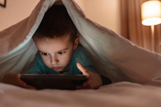670+ Child Hiding Under Blanket Stock Photos, Pictures & Royalty-Free ...