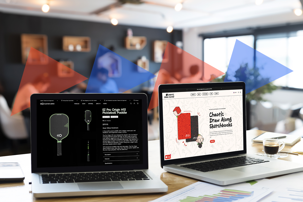 Office workspace with two laptops displaying ecommerce websites, representing custom ecommerce development or headless setup environment.