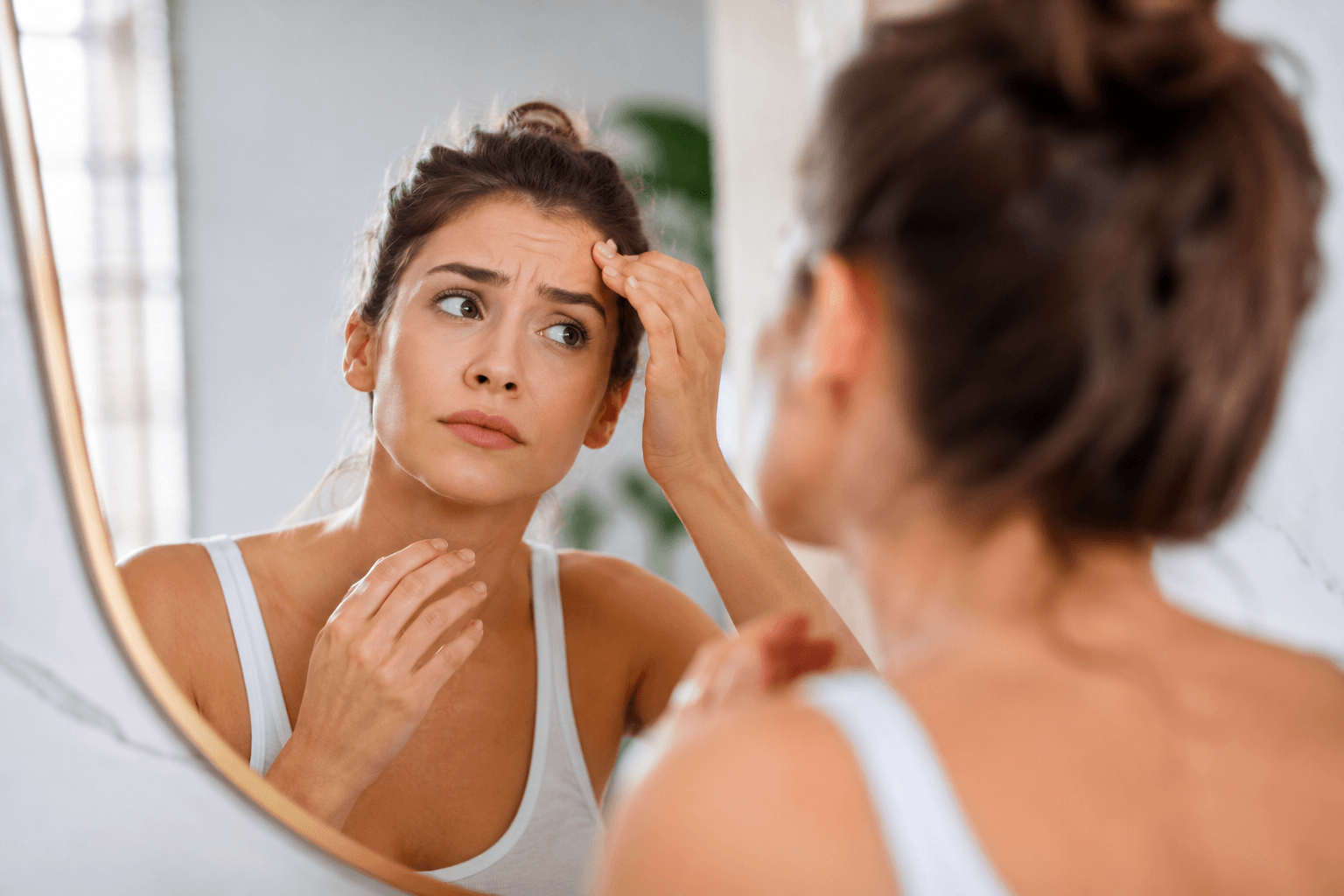 Woman in McMurray, Pennsylvania receiving Dysport treatment for early forehead wrinkles