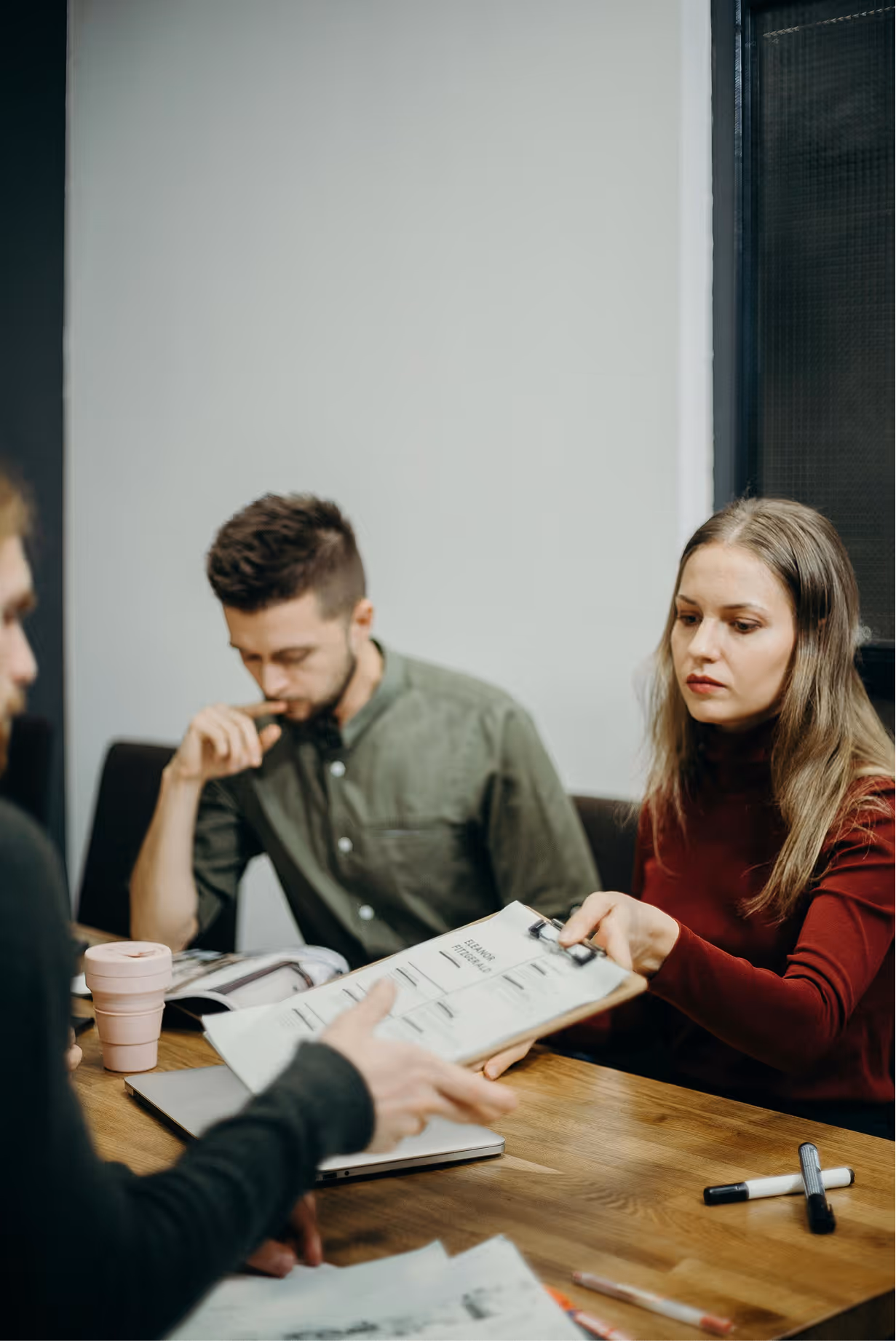 Recruitment team reviewing role requirements together