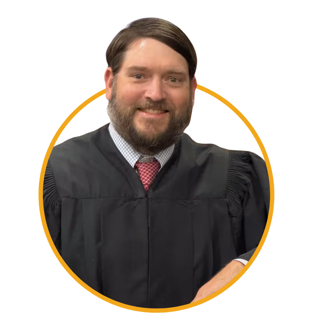 Man with a beard wearing a light blue shirt and dark blazer inside a circular yellow border.