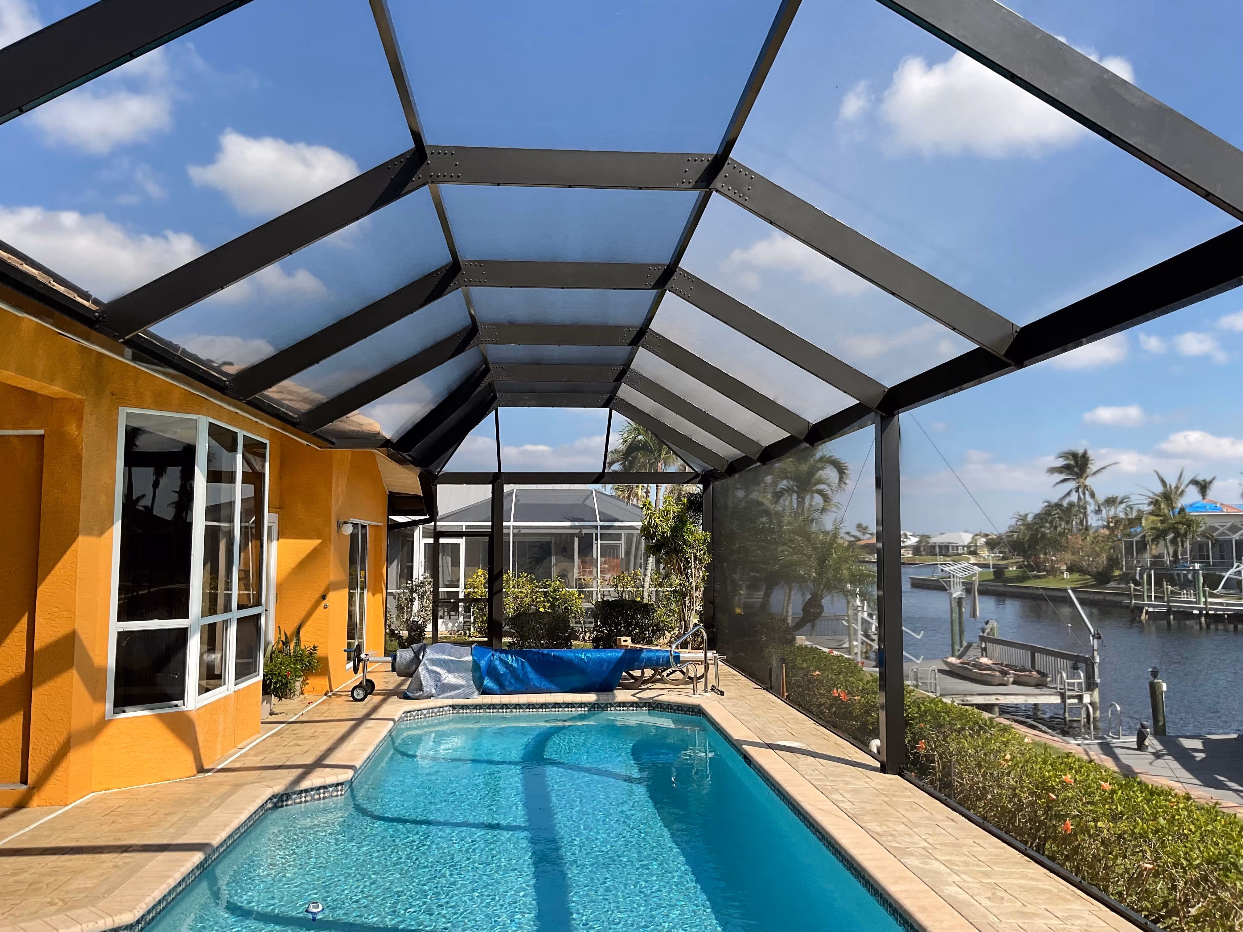 Pool cage with screened entry door South Florida — AB Aluminum & Screens