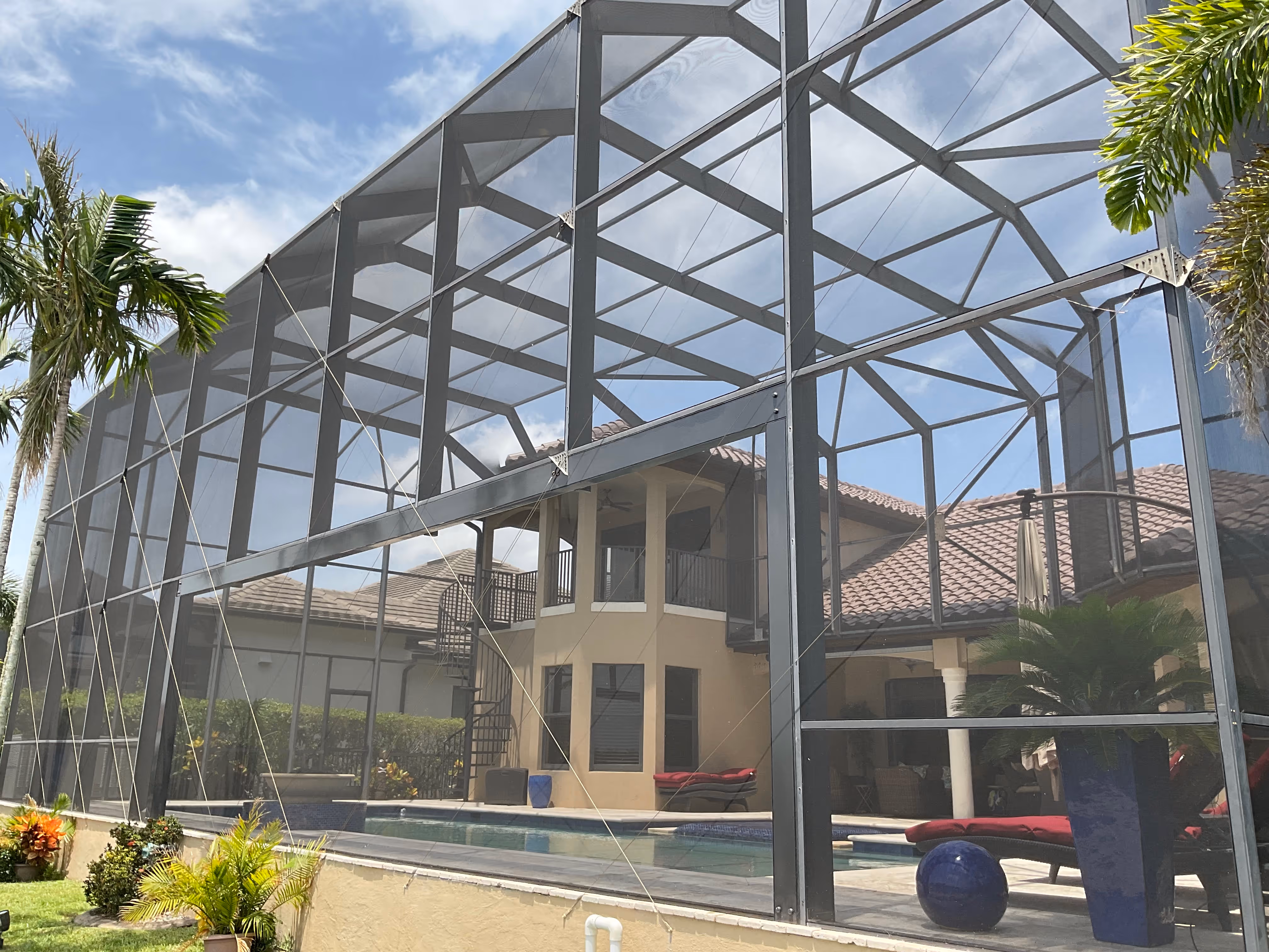 Pool screen enclosure surrounding inground pool South Florida — AB Aluminum & Screens