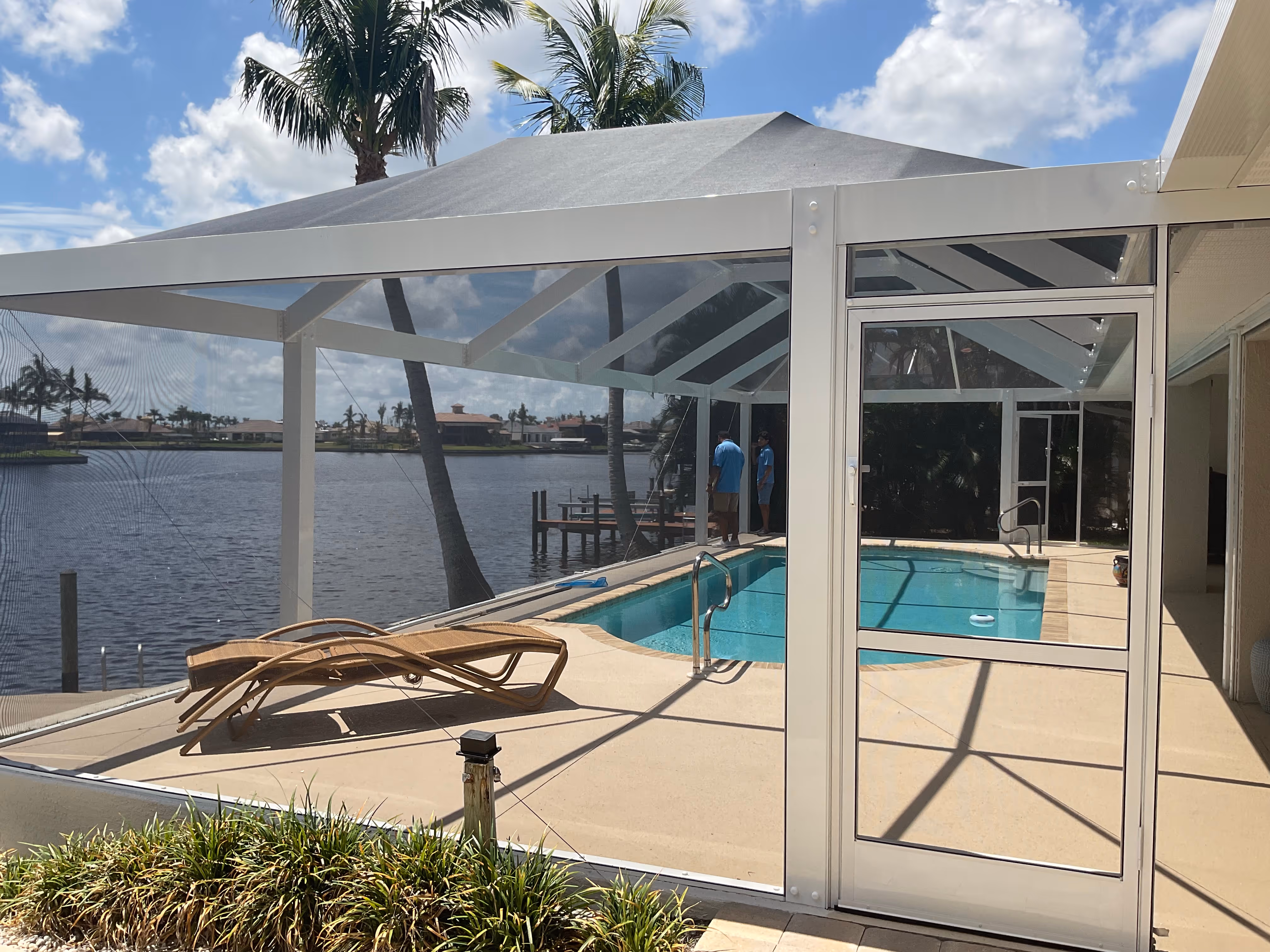 Pool cage installation with screened patio extension — AB Aluminum & Screens South Florida