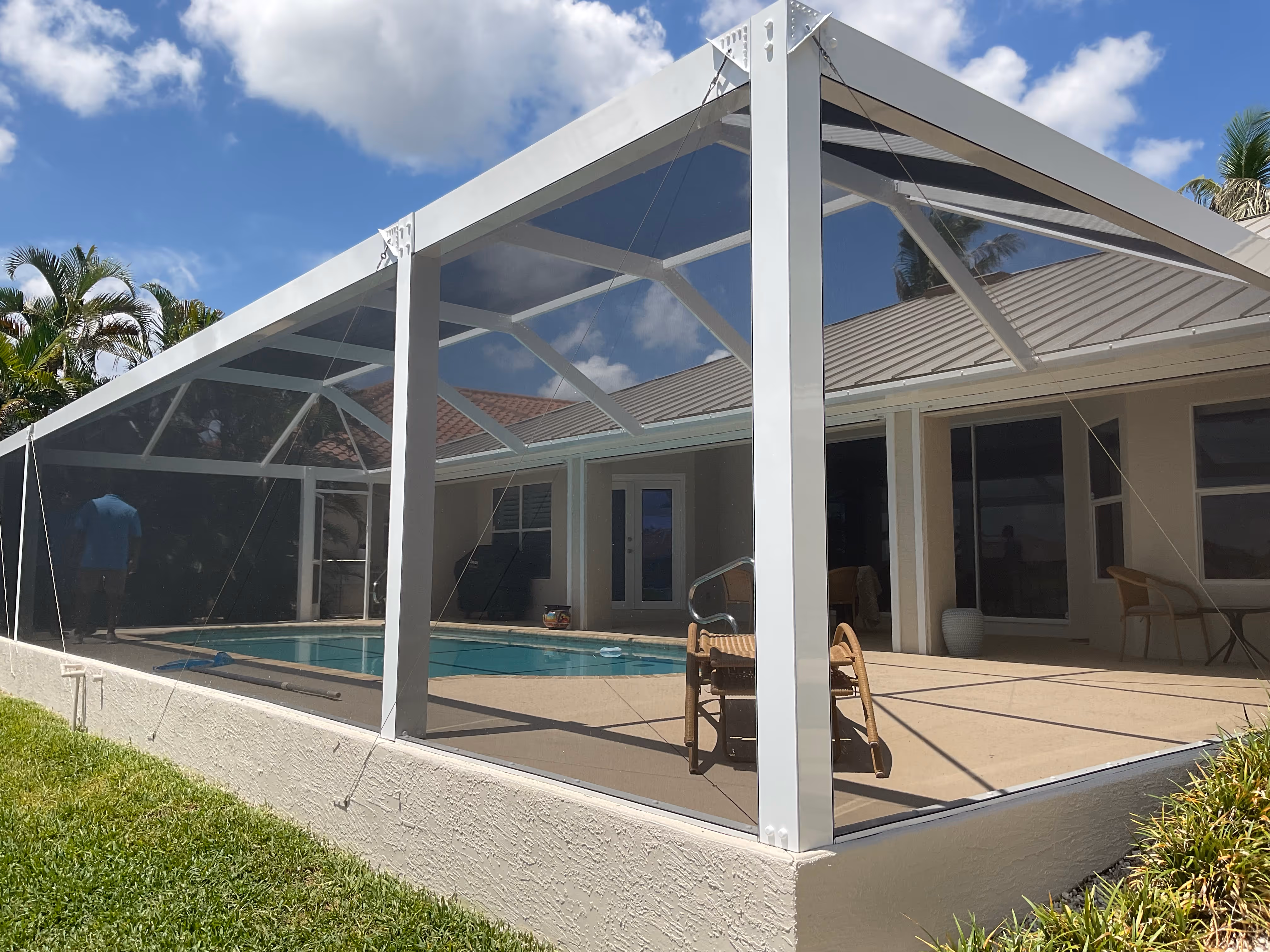 Aluminum pool screen enclosure South Florida waterfront home — AB Aluminum & Screens