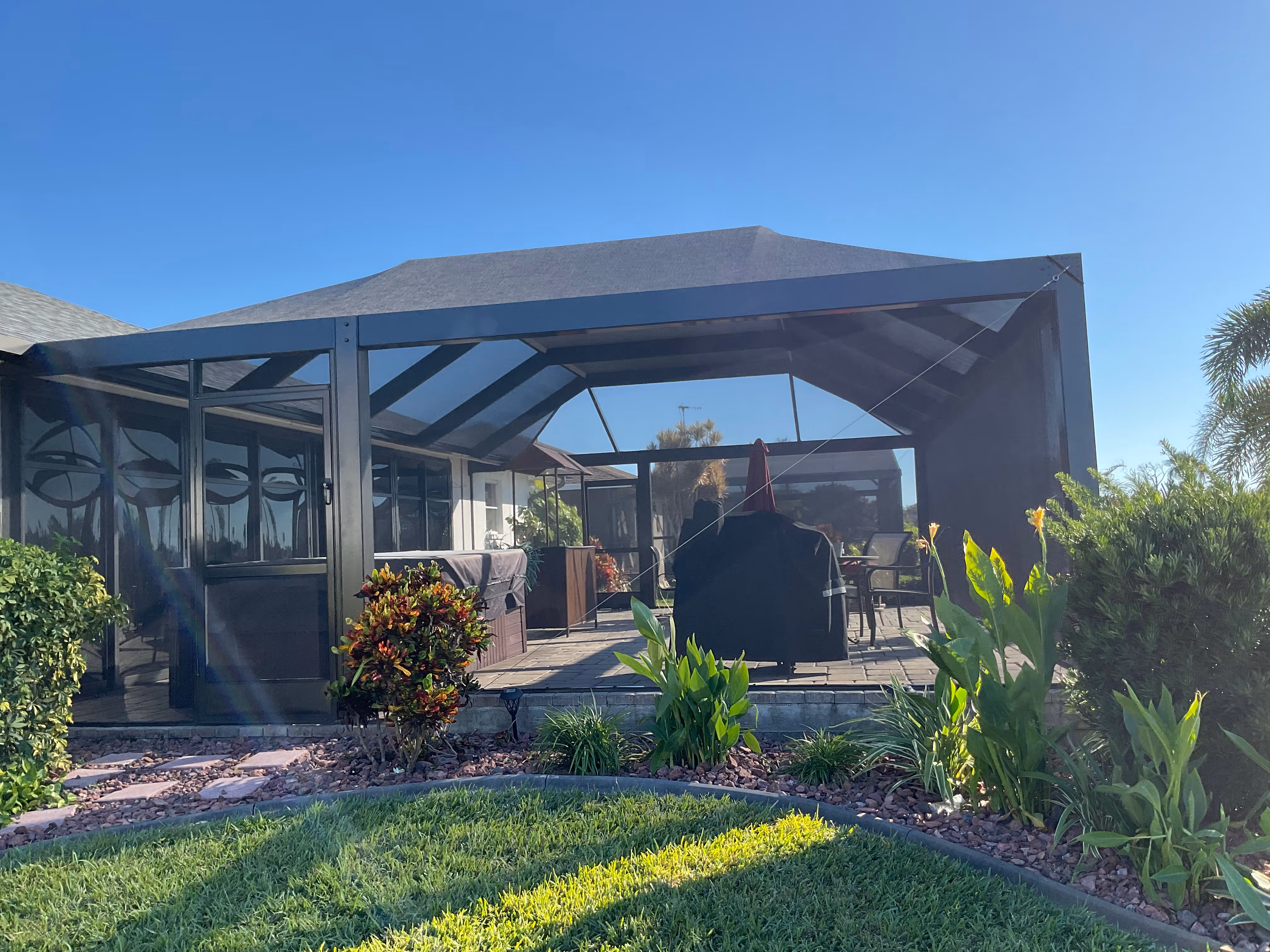 aluminum pool screen enclosure added to existing pool in Palmetto Bay, Miami-Dade