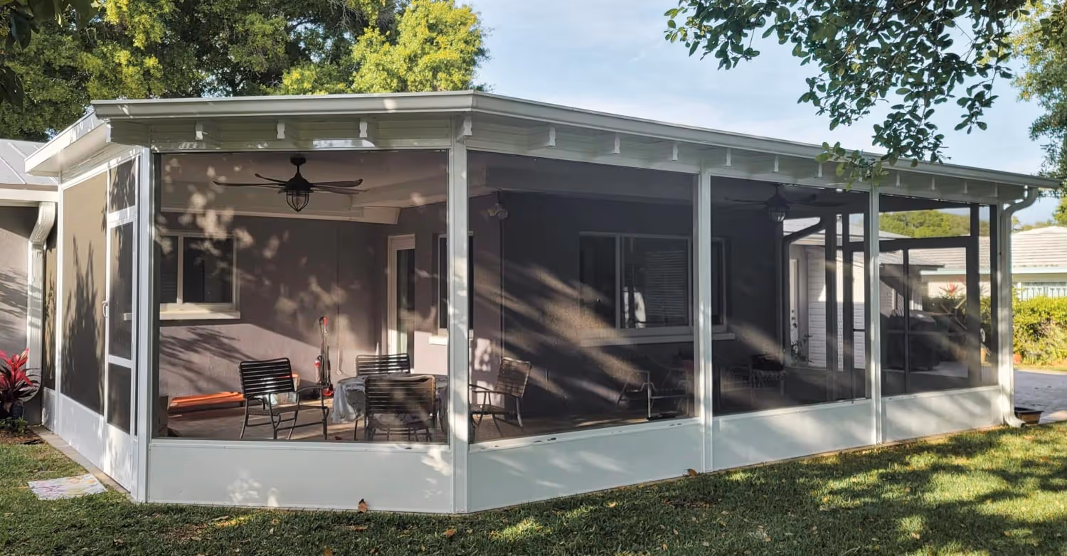 Patio screen enclosure in Wellington, Palm Beach County — preparing for hurricane season in South Florida