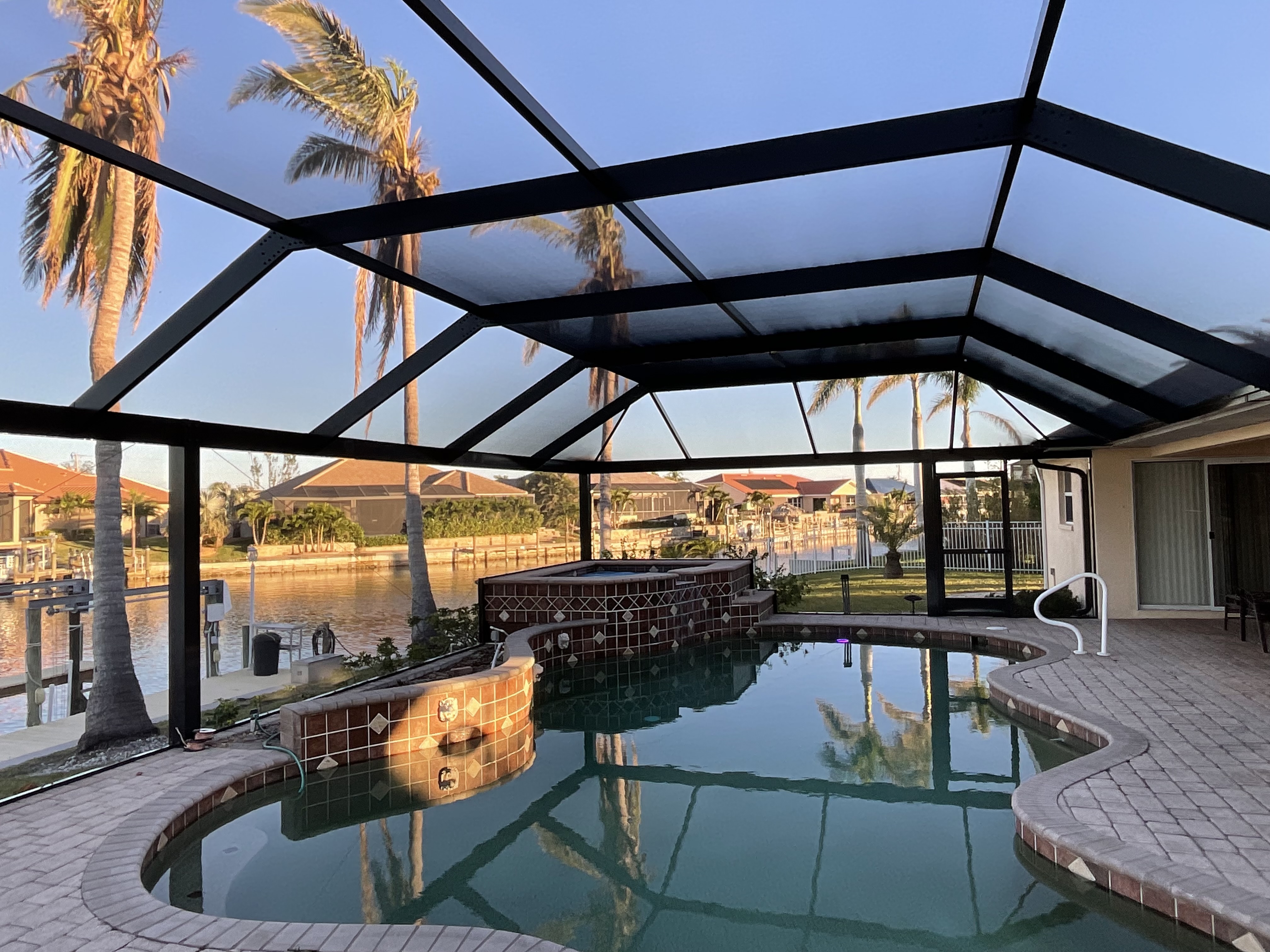 Pool cage installation with aluminum frame South Florida — AB Aluminum & Screens