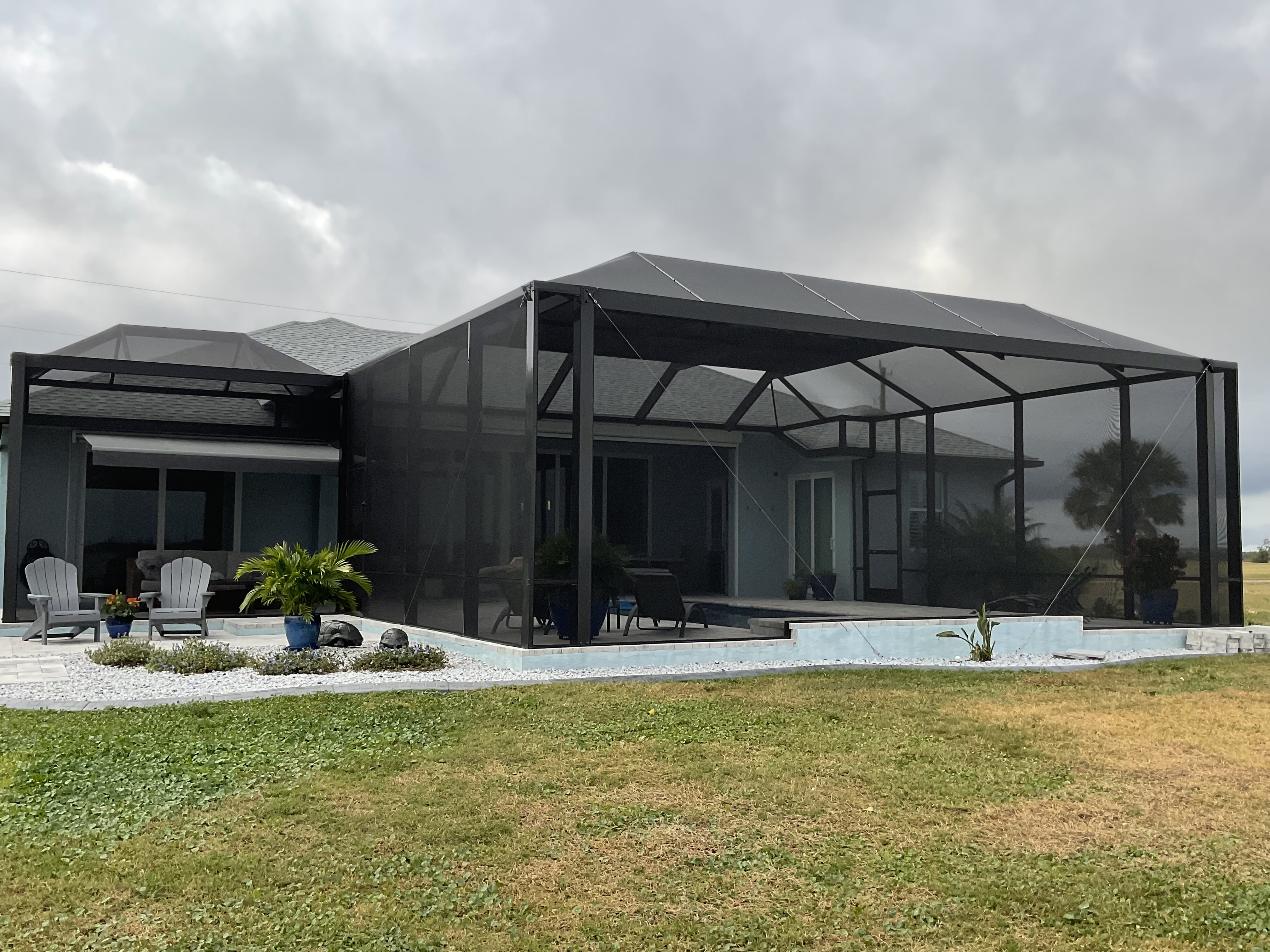 Aluminum mesh pool cage installation Miami — AB Aluminum & Screens