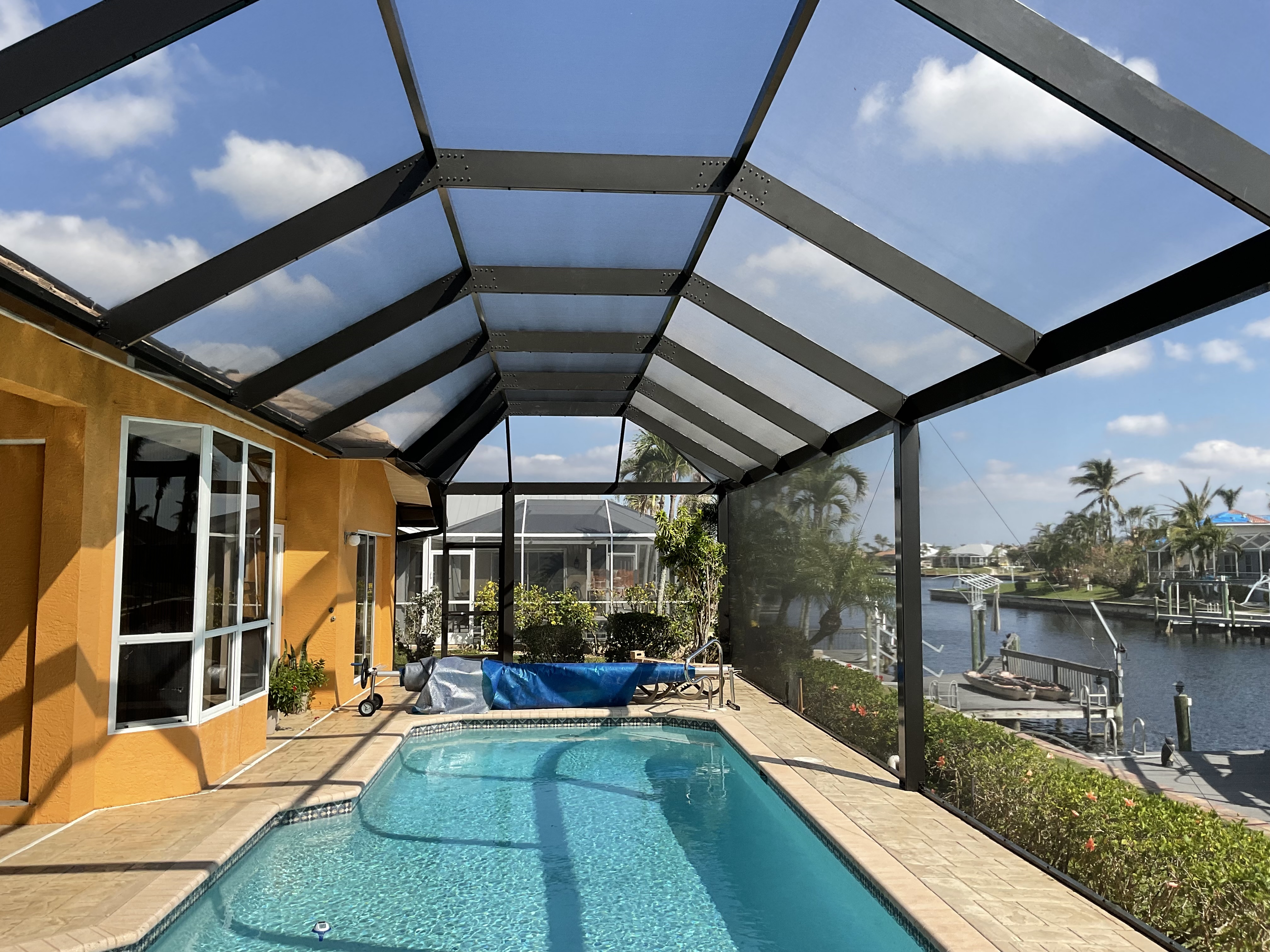 Pool cage with screened entry door South Florida — AB Aluminum & Screens
