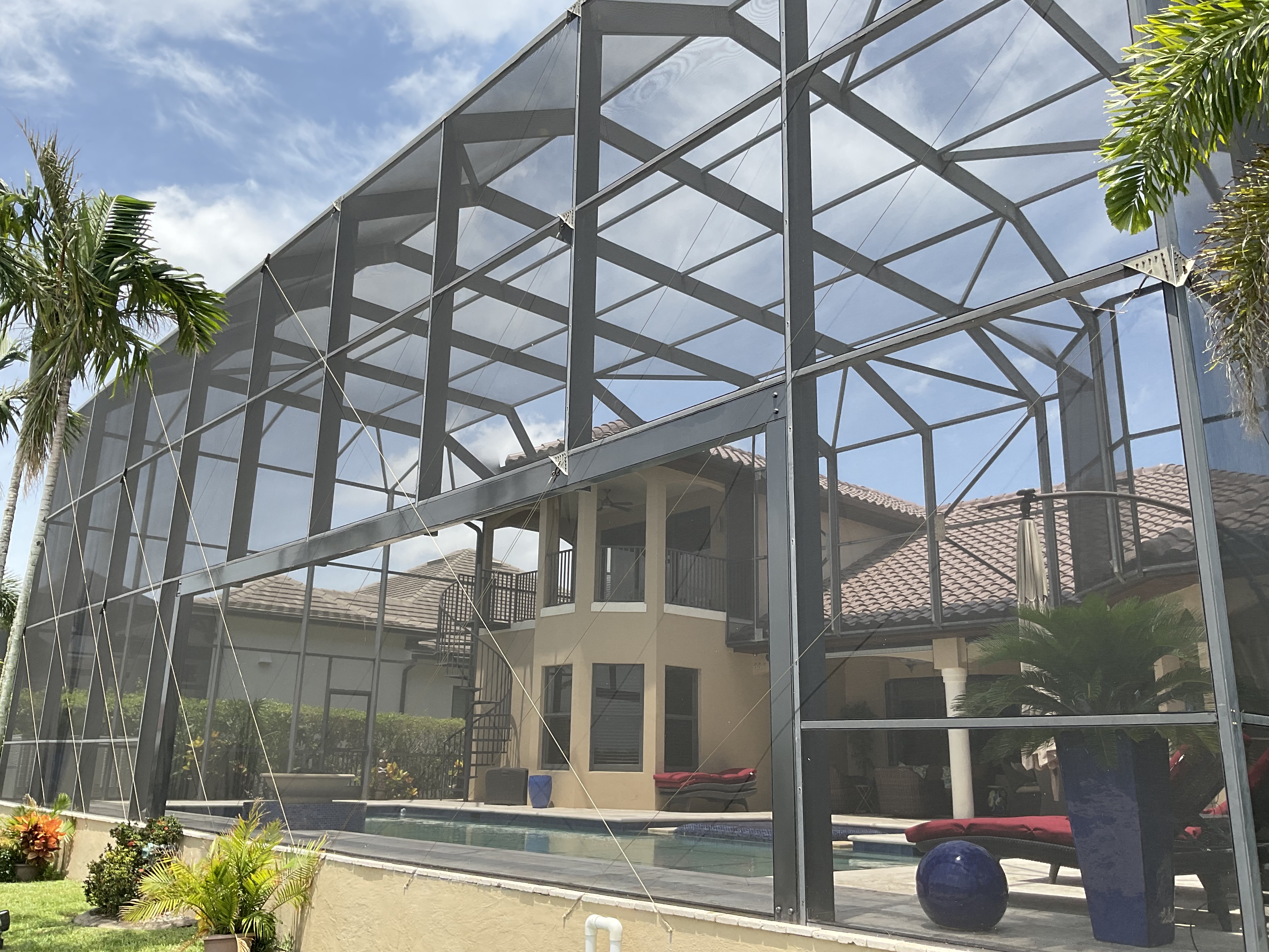 Pool screen enclosure surrounding inground pool South Florida — AB Aluminum & Screens