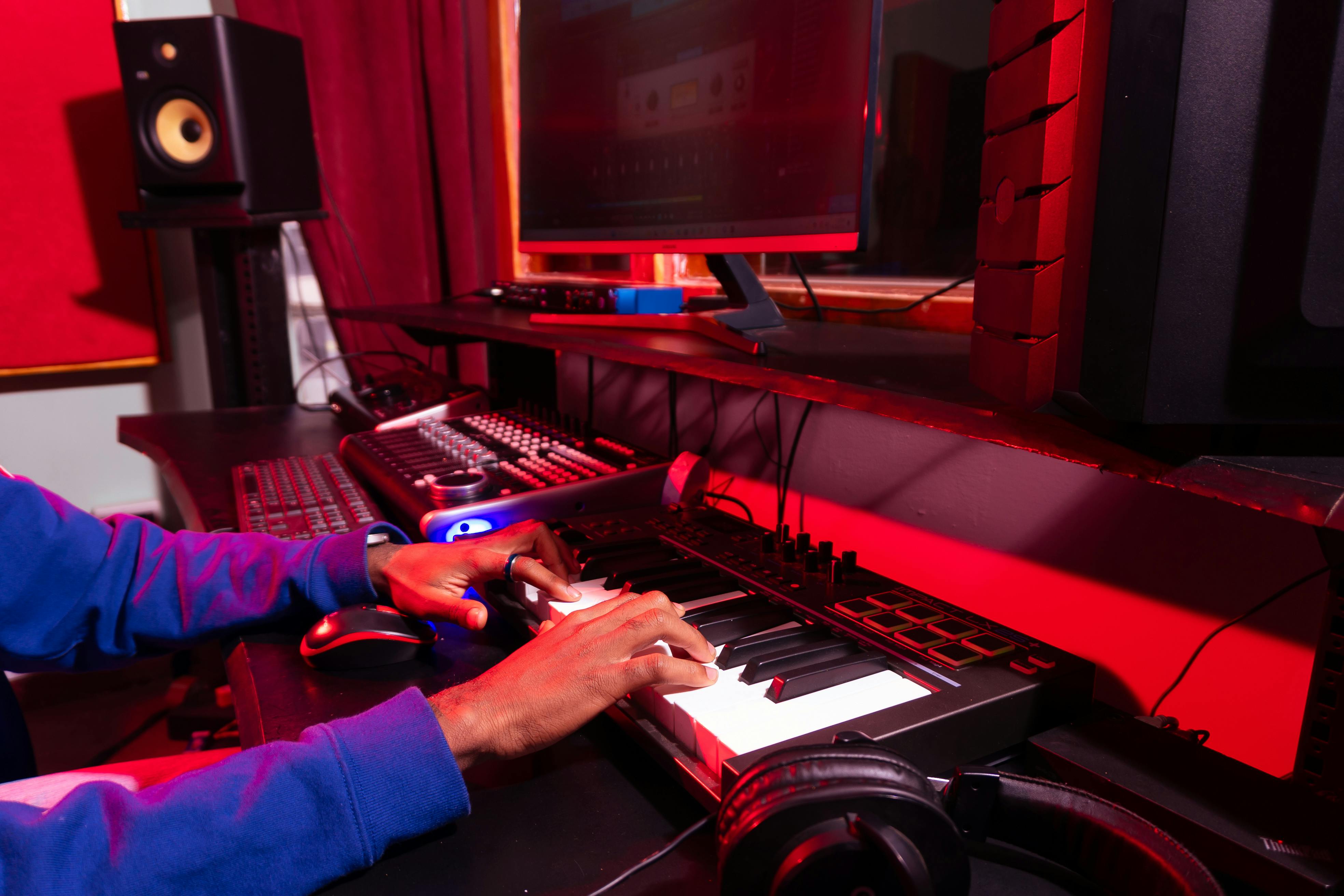 A music studio with advanced production equipment, representing a traditional studio.