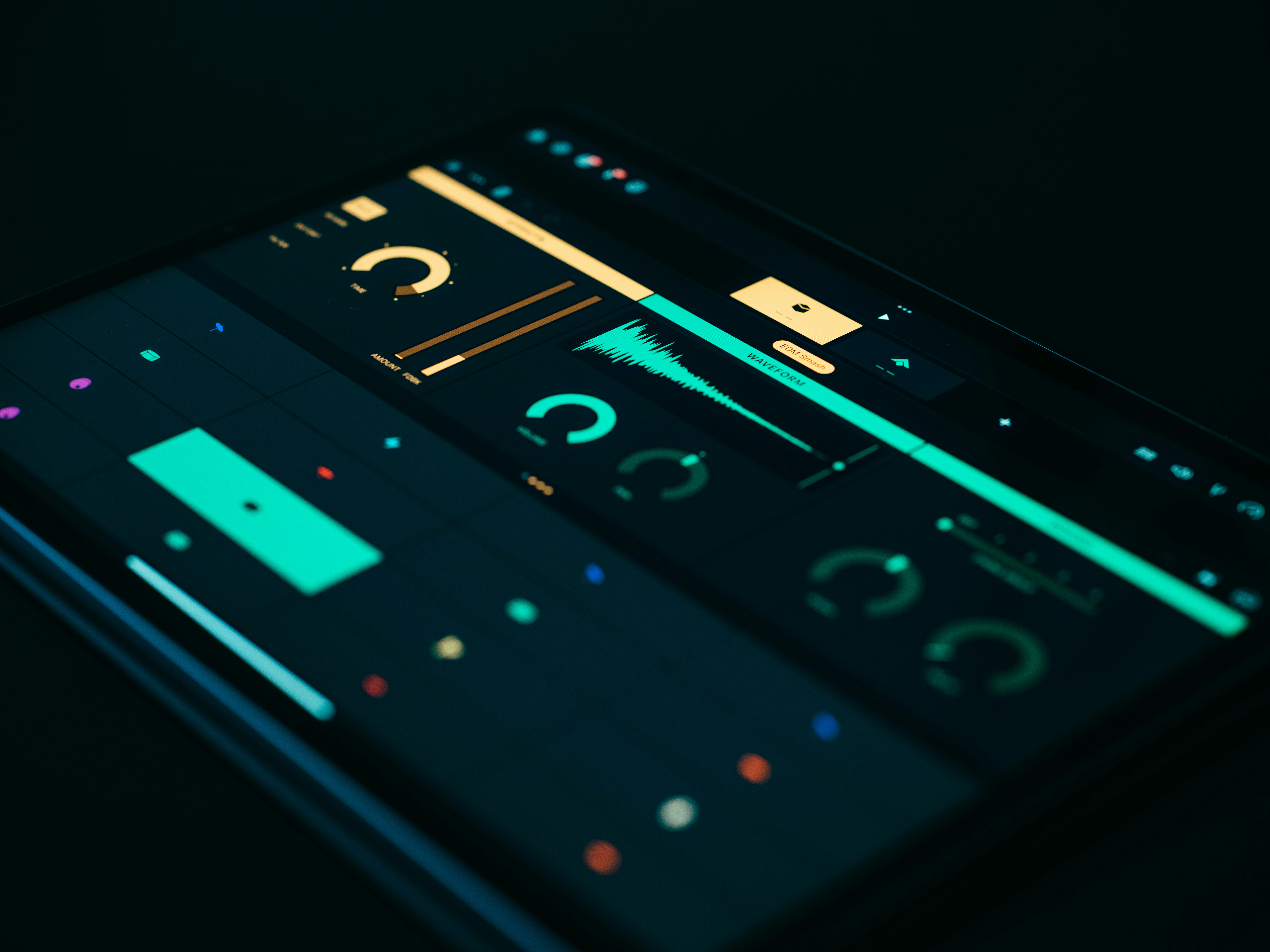 A tablet open to a music production app, showing how mobile music studios are active and growing.