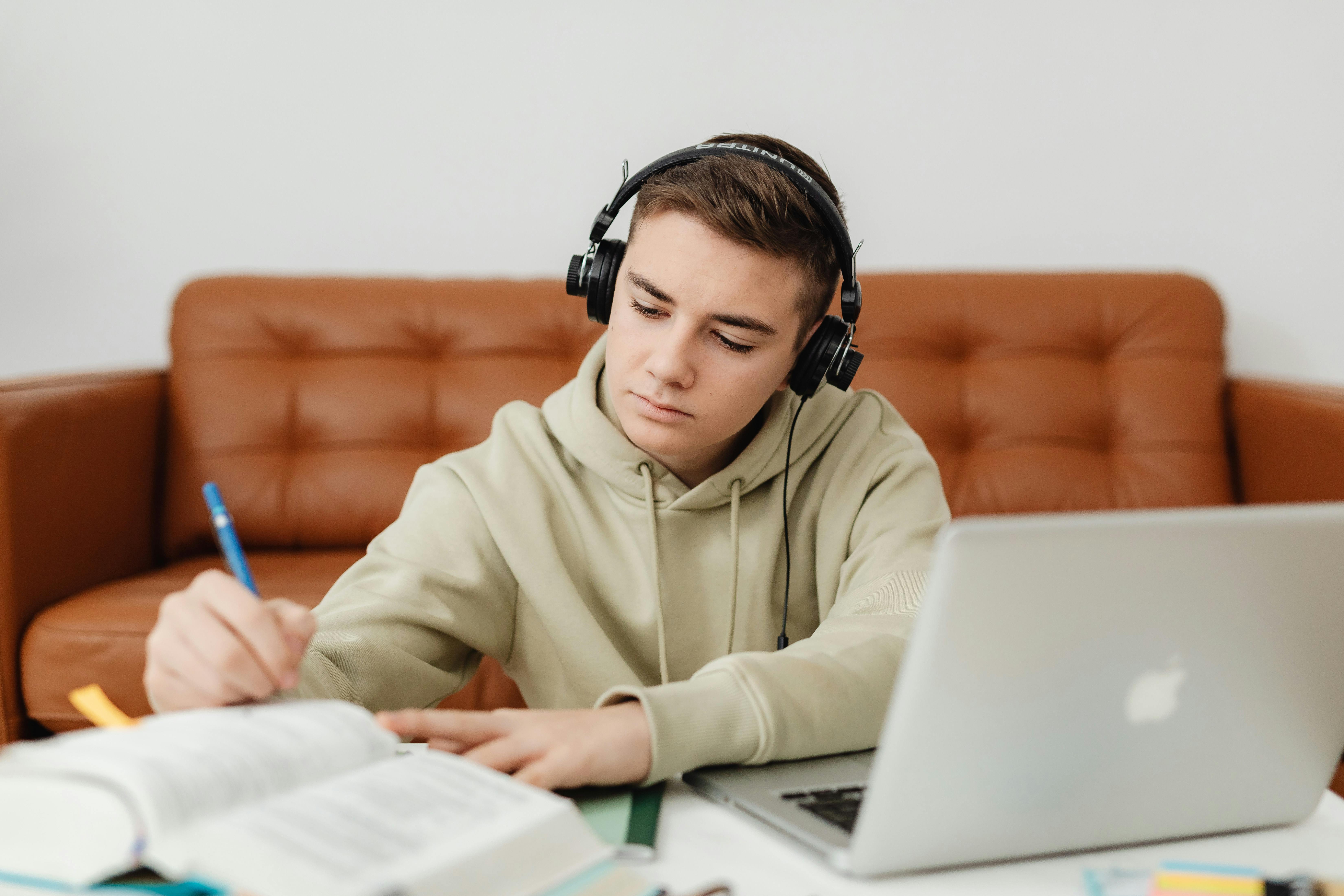 A person working with headphones on, representing the use for ambient sound.