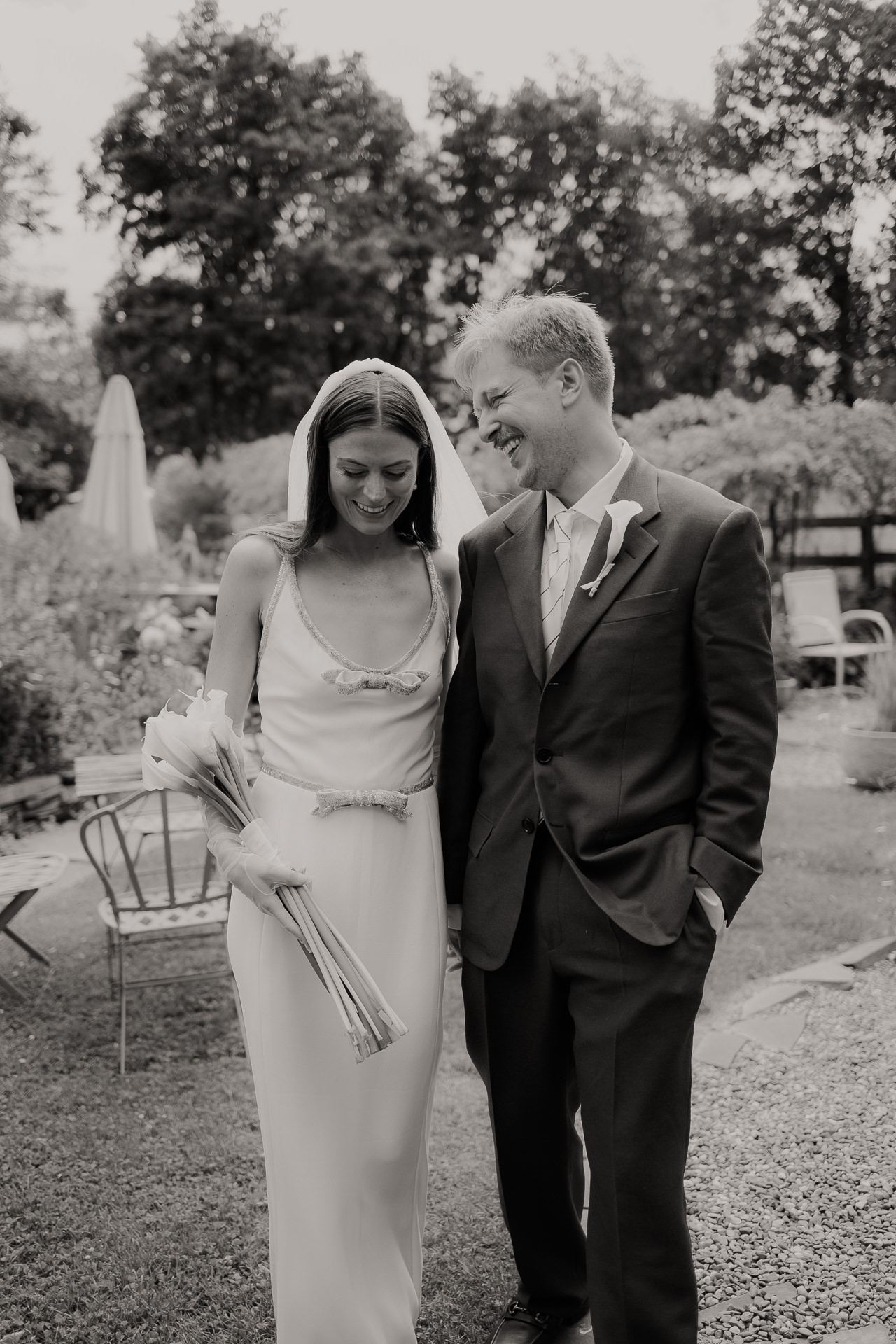 Black and white portrait of a bride and groom in the garden at an M and D Farm wedding
