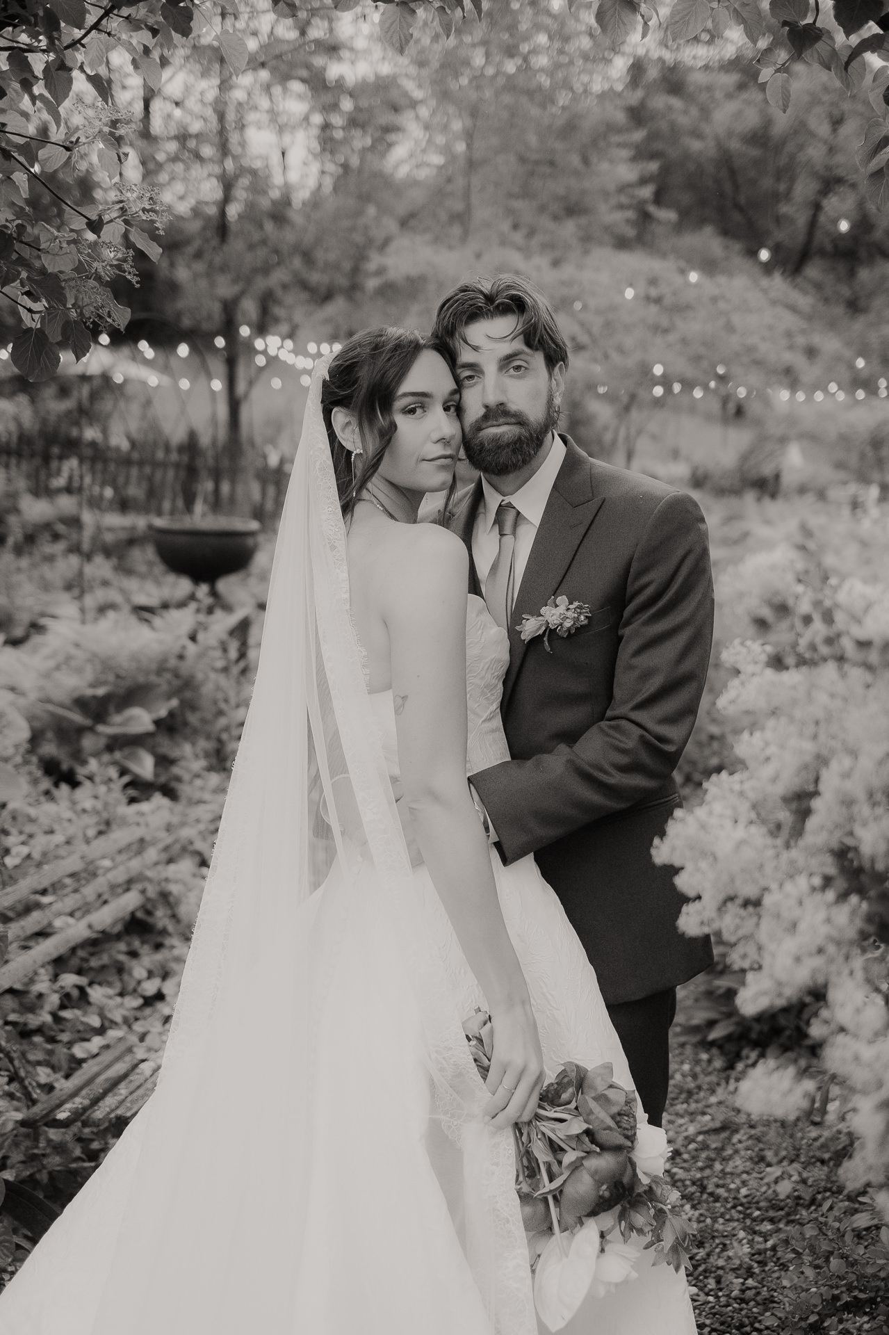 Black and white portrait of a couple outdoors at a spring M and D Farm wedding