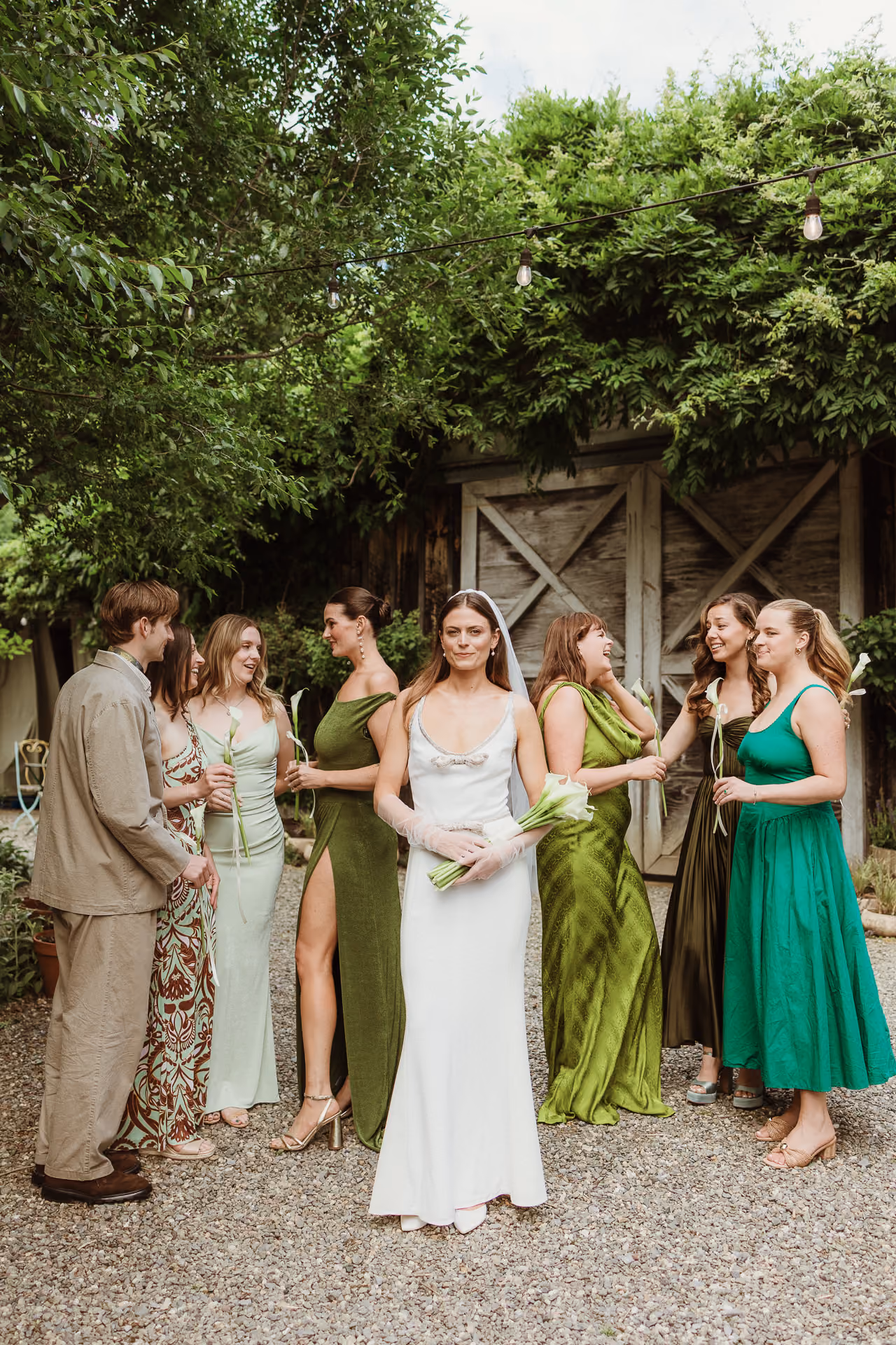 Bride and groom embracing in golden evening light at an Old Mill Guesthouse wedding