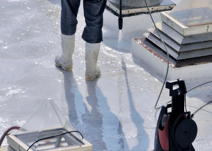 a roofer in plastic boots using Turbo Set's advanced Blue-Cure Technology enables rapid drying and curing