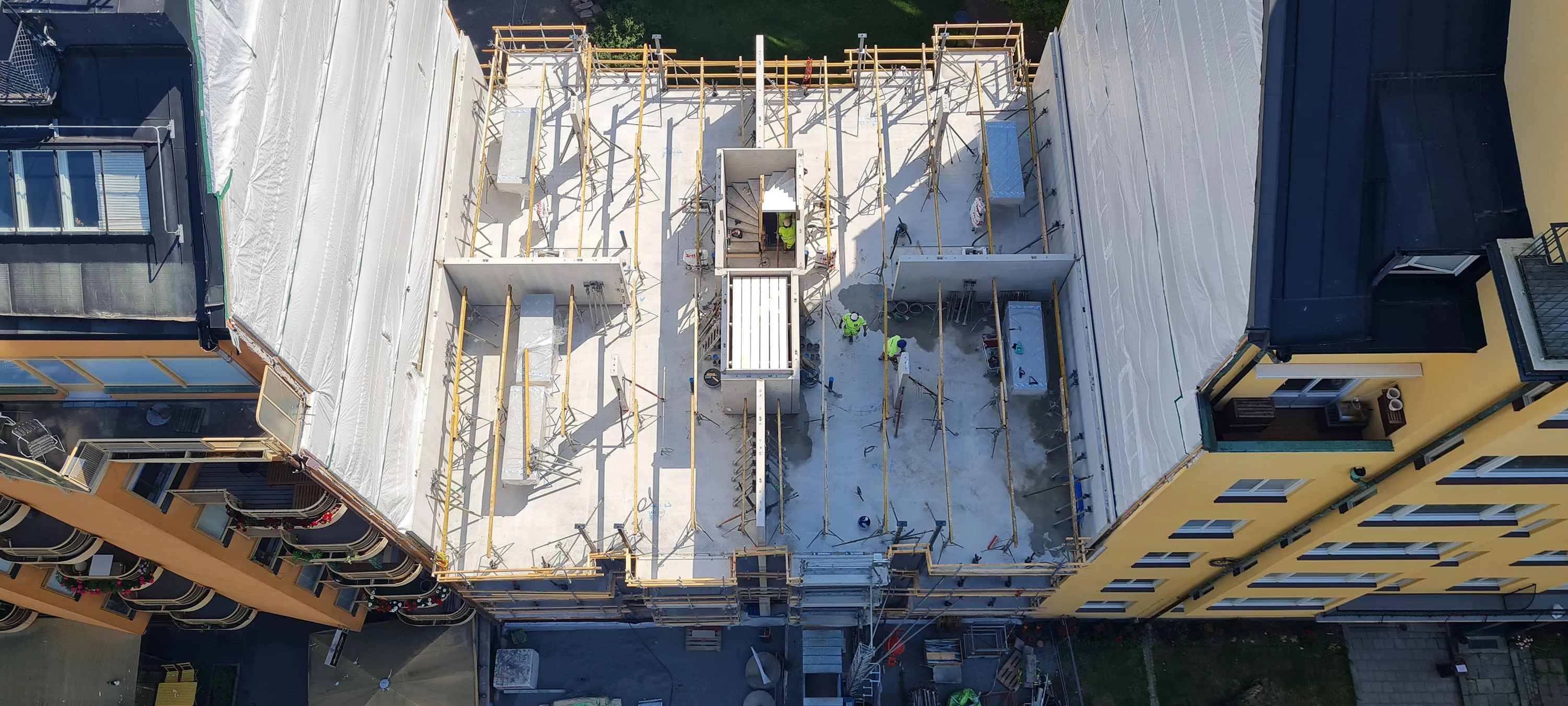 Kvarteret Propellerhuset sett uppifrån under byggnation.