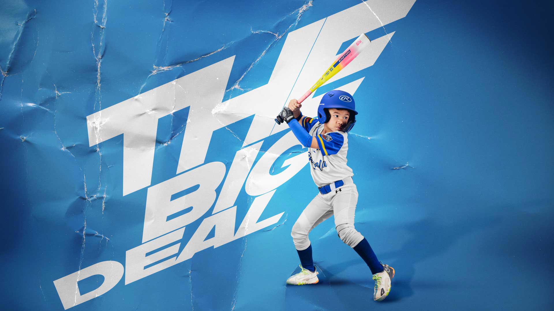 Young baseball player in action pose during a professional photo session in Plano, Texas