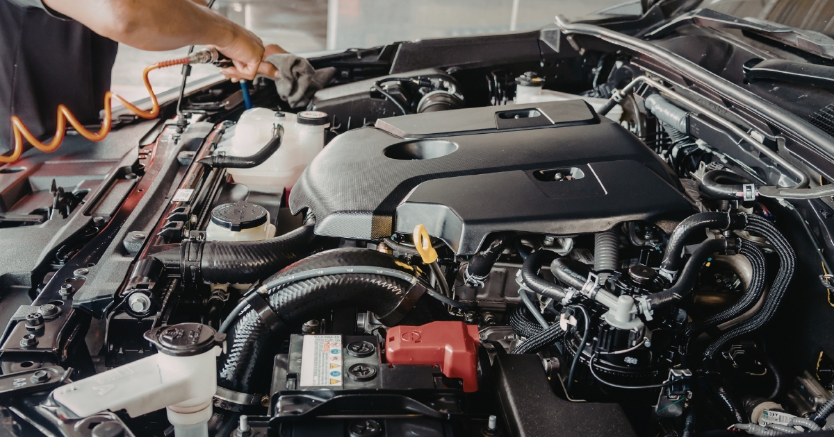 image of car engine being maintained