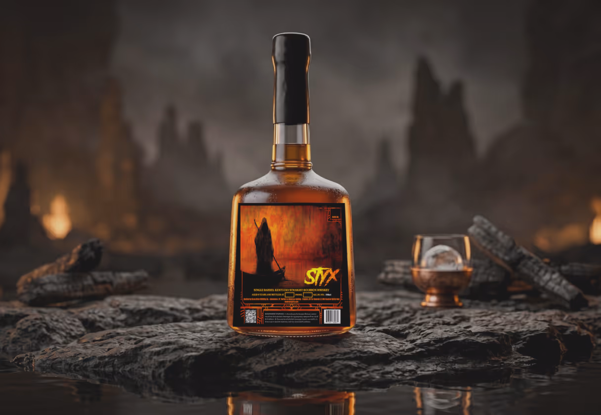 Bottle of bourbon whiskey with a dark label featuring a figure in a boat, placed on rocky surface next to a glass with a large ice sphere in a dim, moody setting.