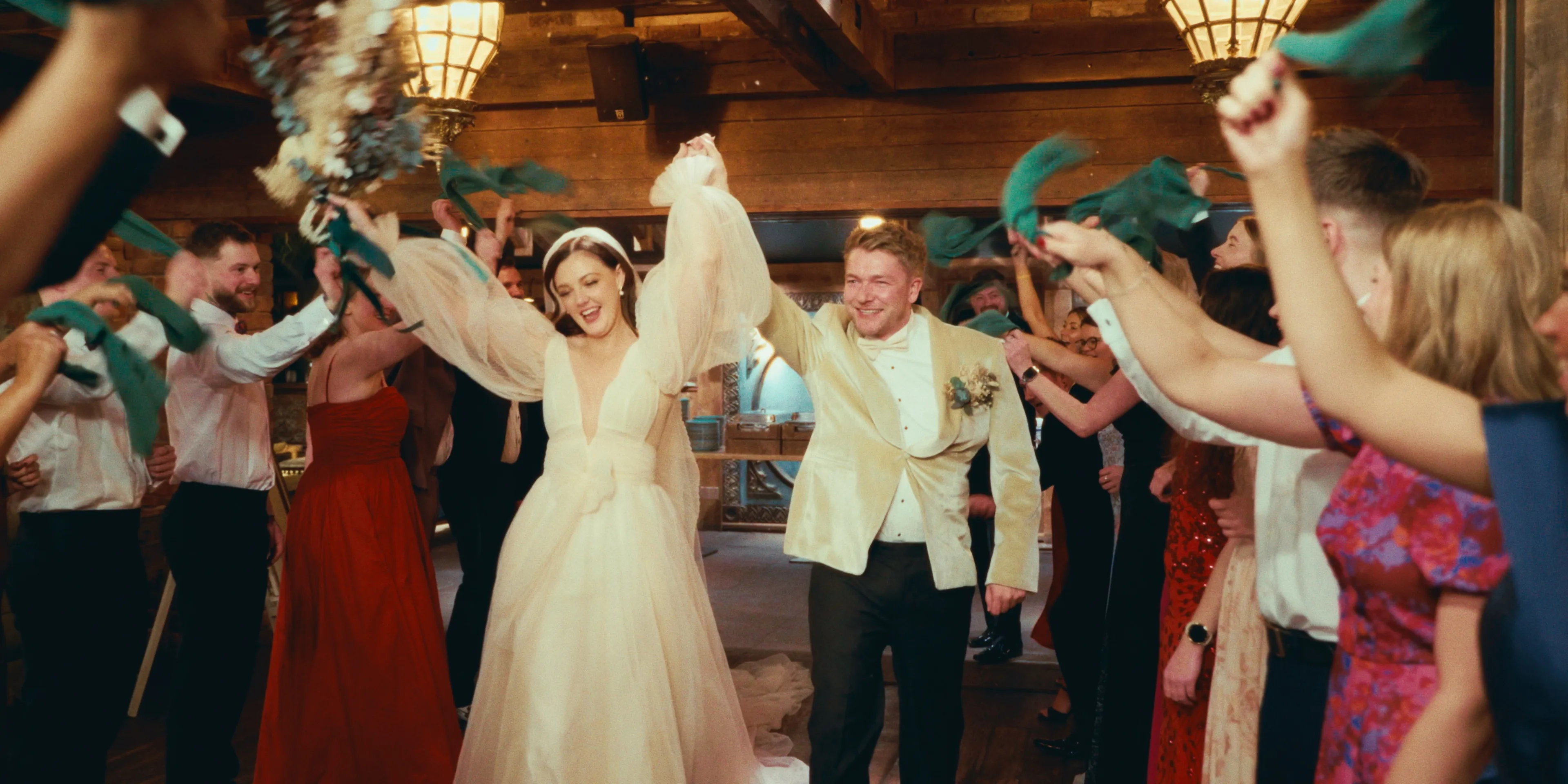 Bride and Groom entering their reception.