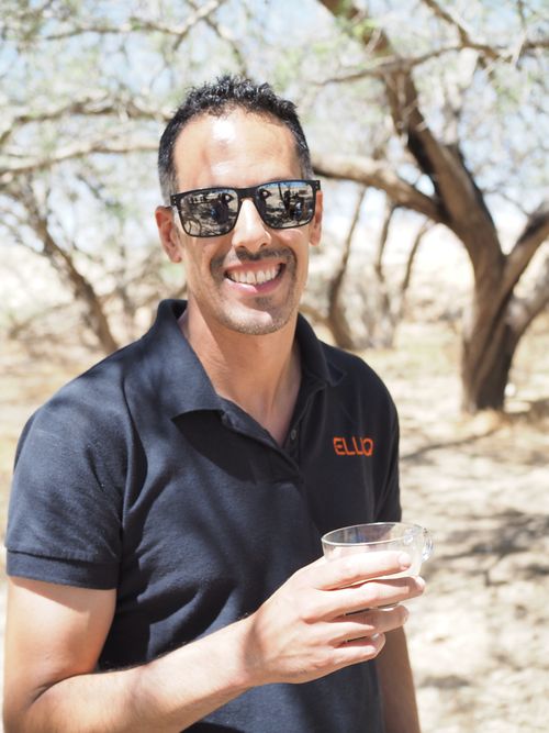 guy smiling in a company event