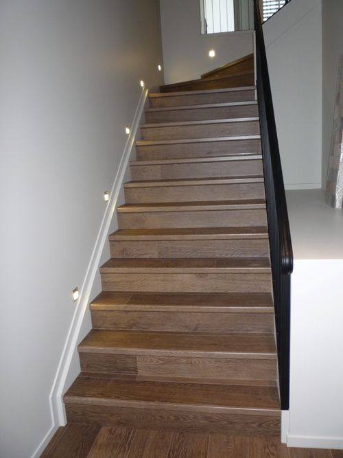 Cover grade staircase overlayed with timber flooring
