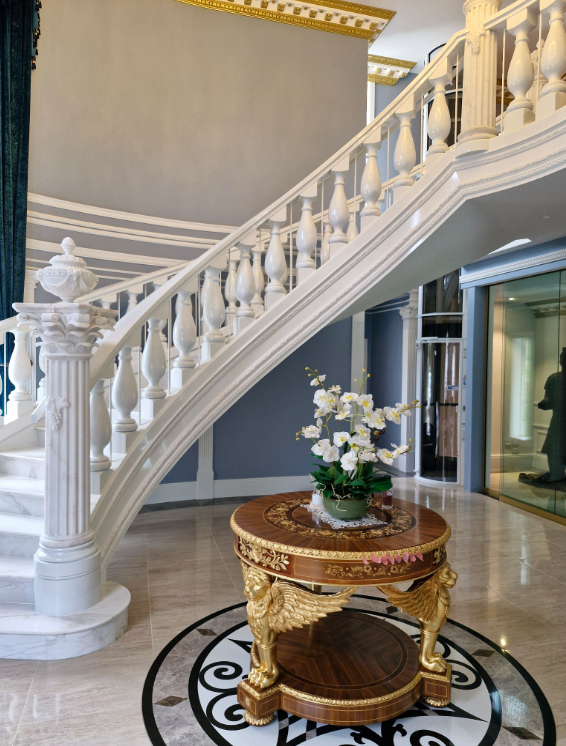 Side view of curved floating staircase showing underside of the stairs