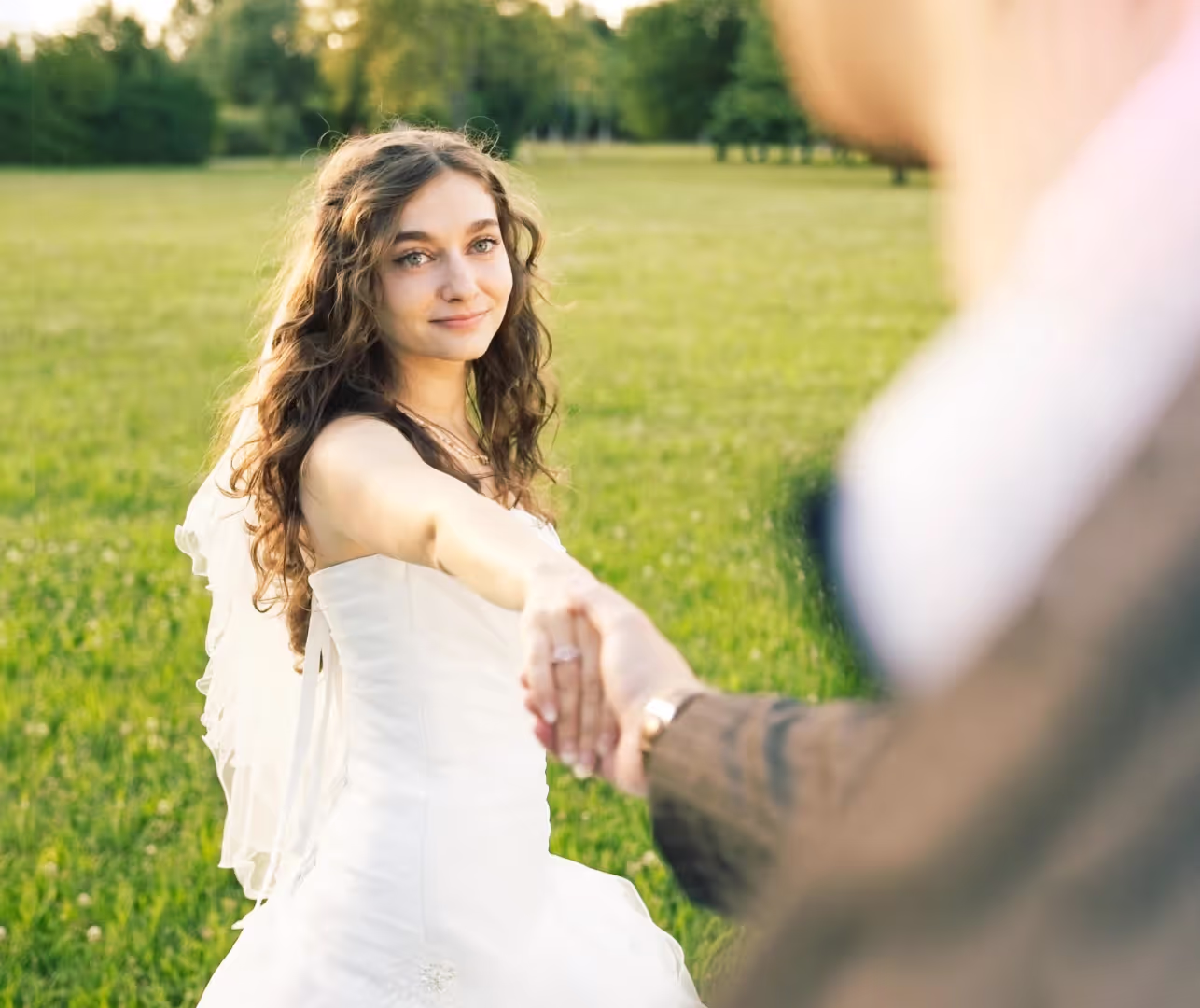 bride holding hands on wedding