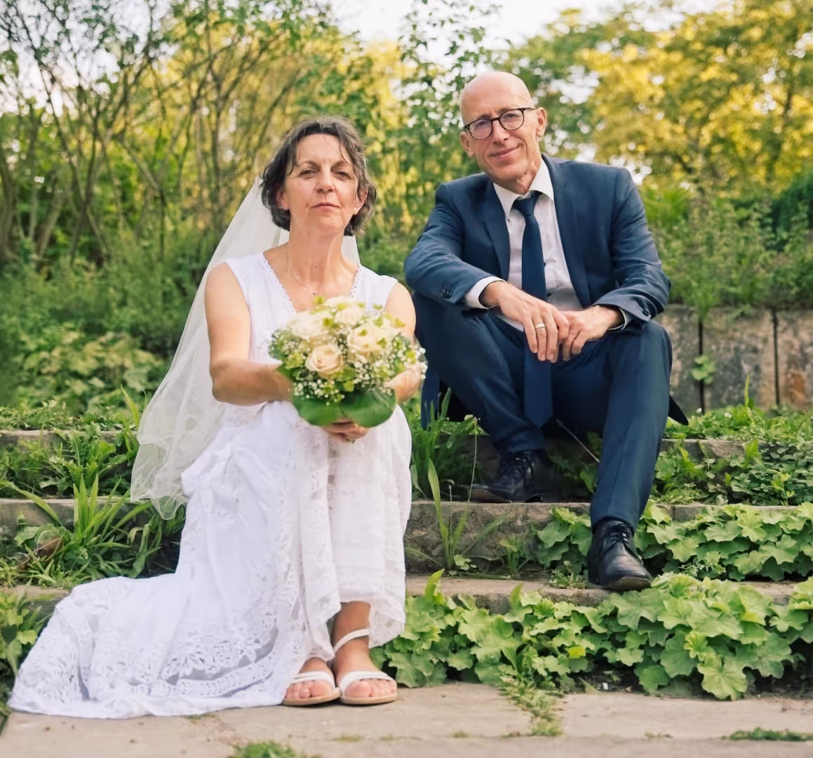 bride and groom sitting on the floor